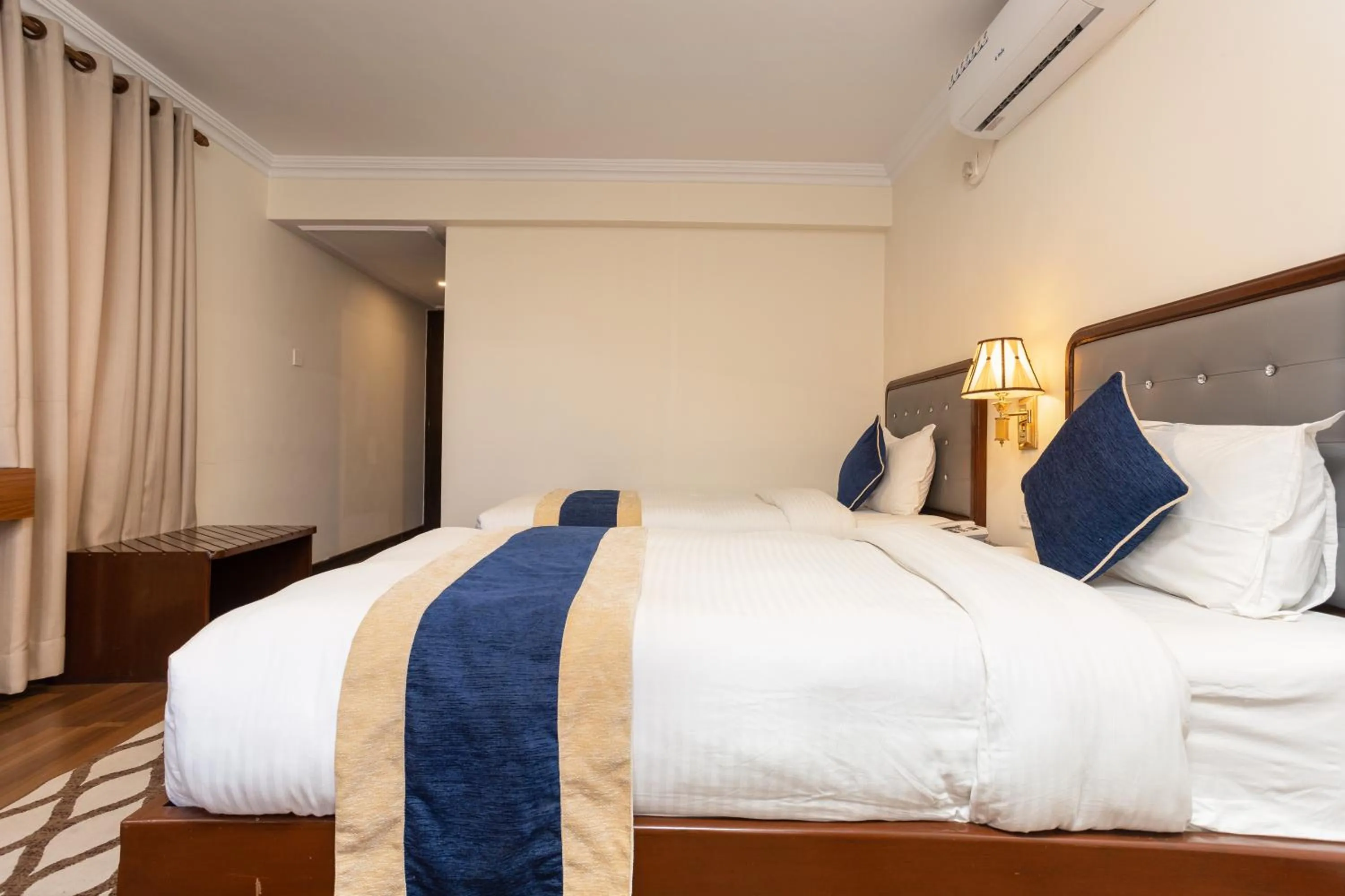 Bed in Kathmandu Business Hotel