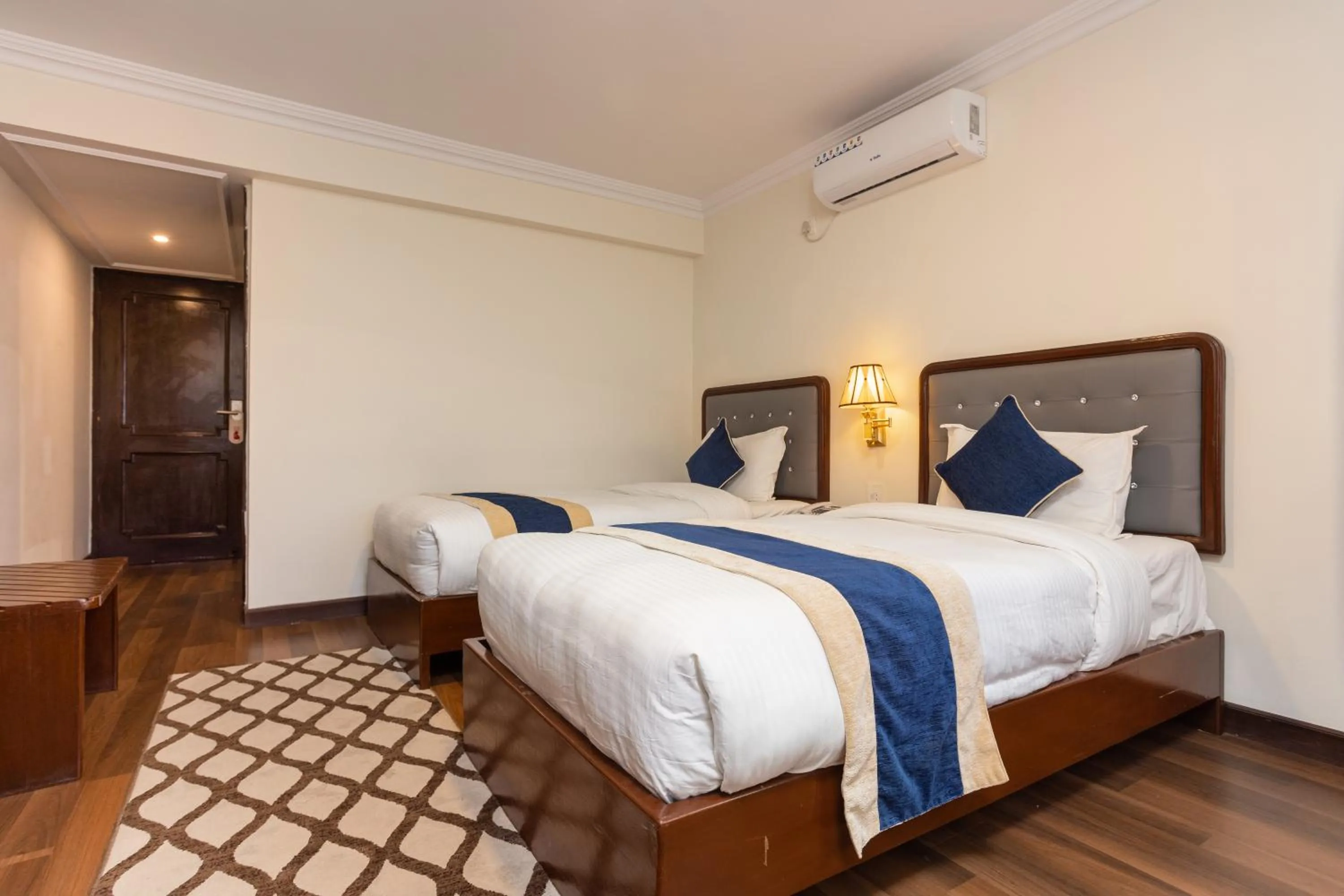 Bed in Kathmandu Business Hotel