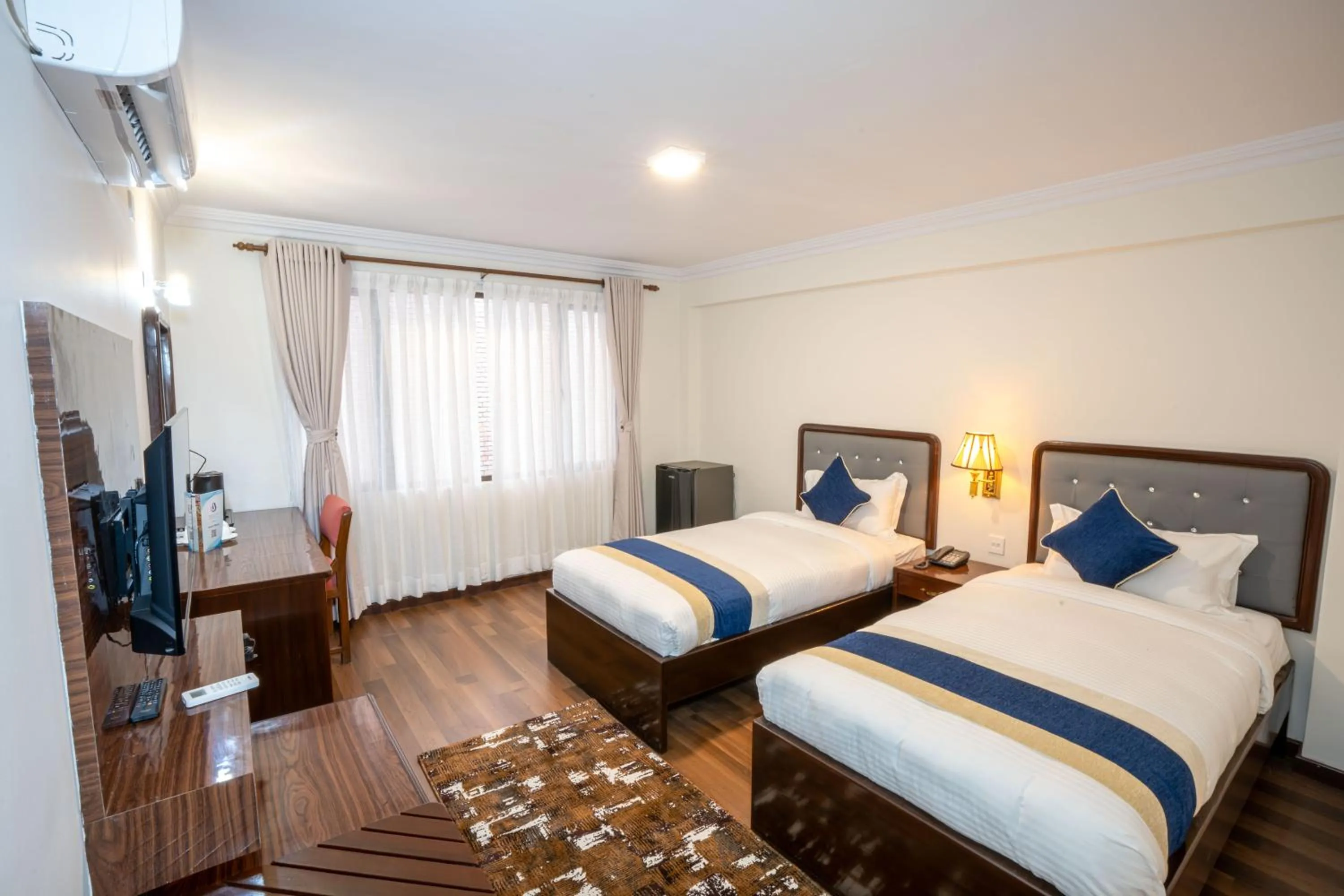 Bed in Kathmandu Business Hotel