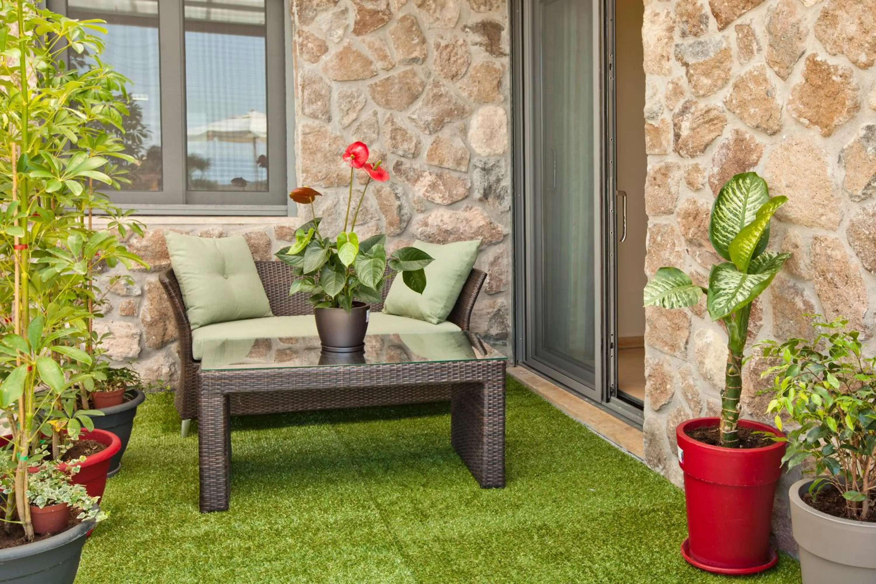 Patio in Marini Luxury Apartments and Suites