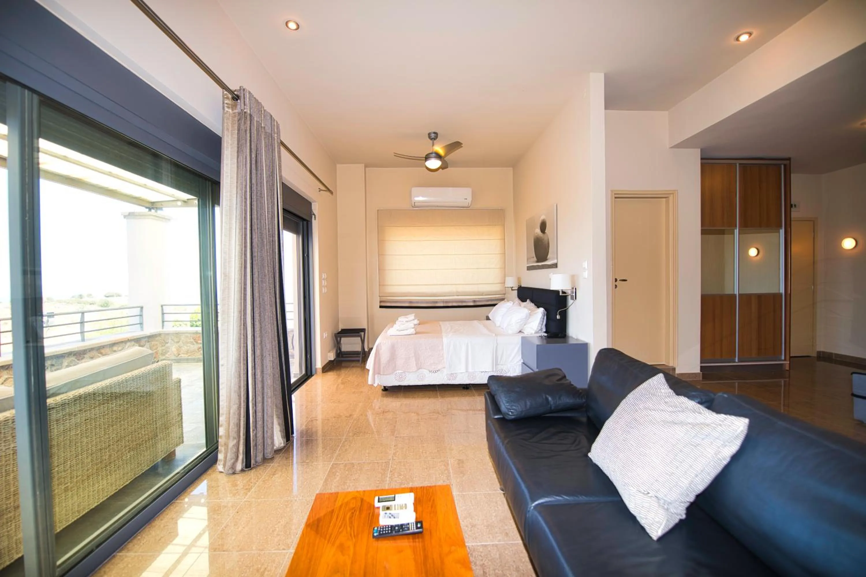 Bed in Marini Luxury Apartments and Suites