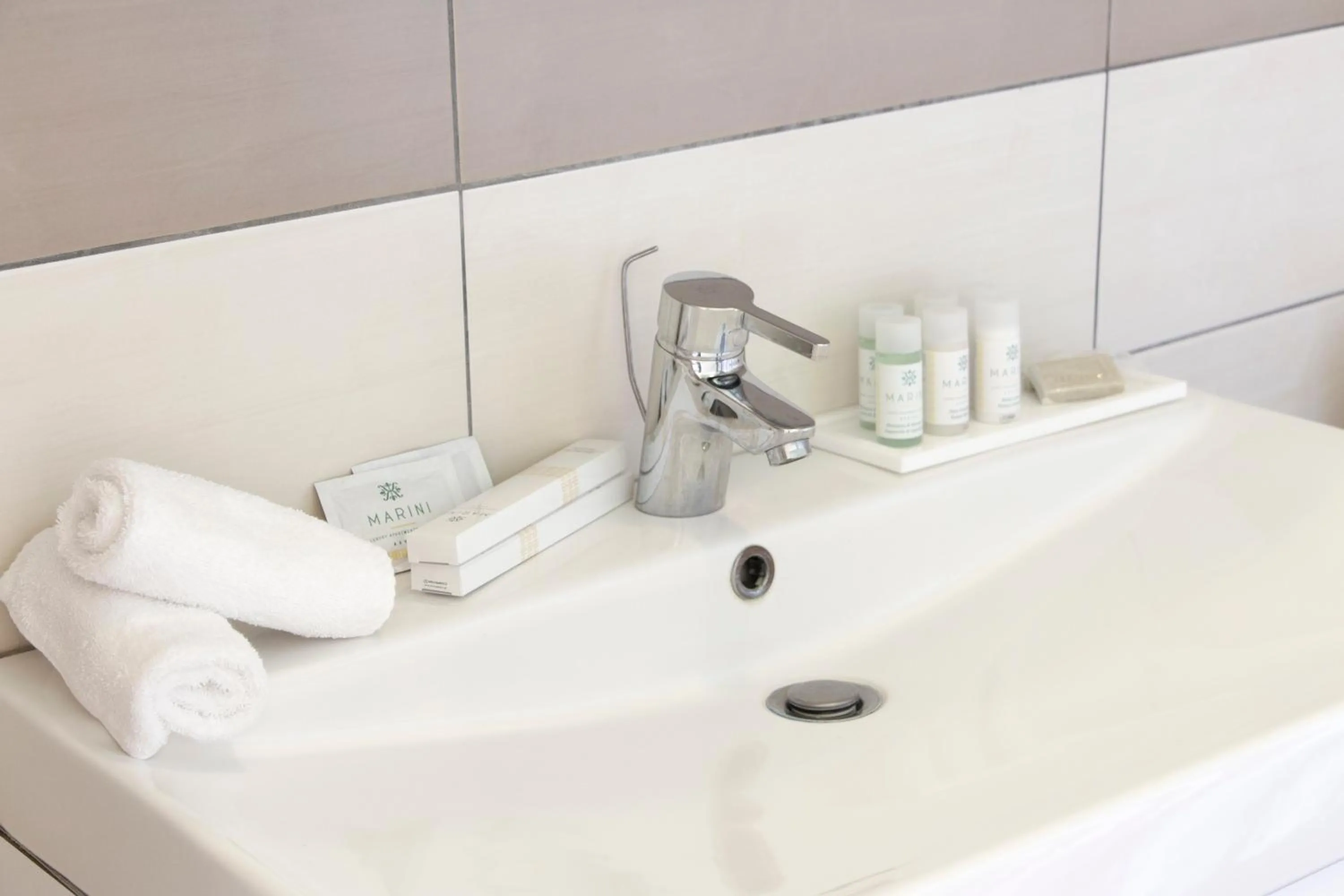 Bathroom in Marini Luxury Apartments and Suites