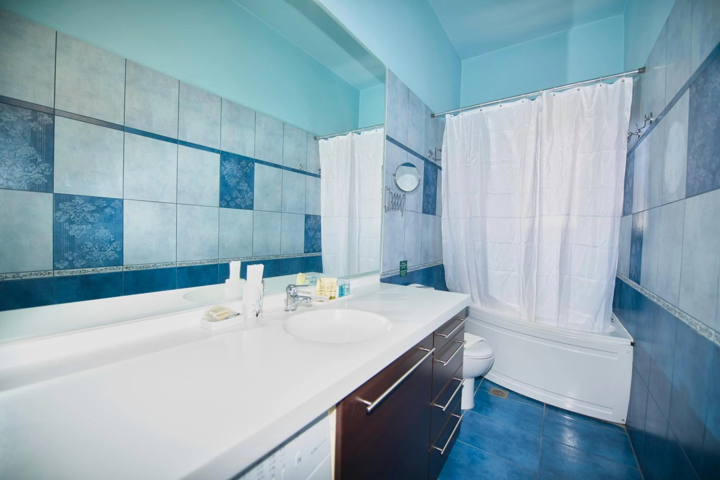 Bathroom in Marini Luxury Apartments and Suites