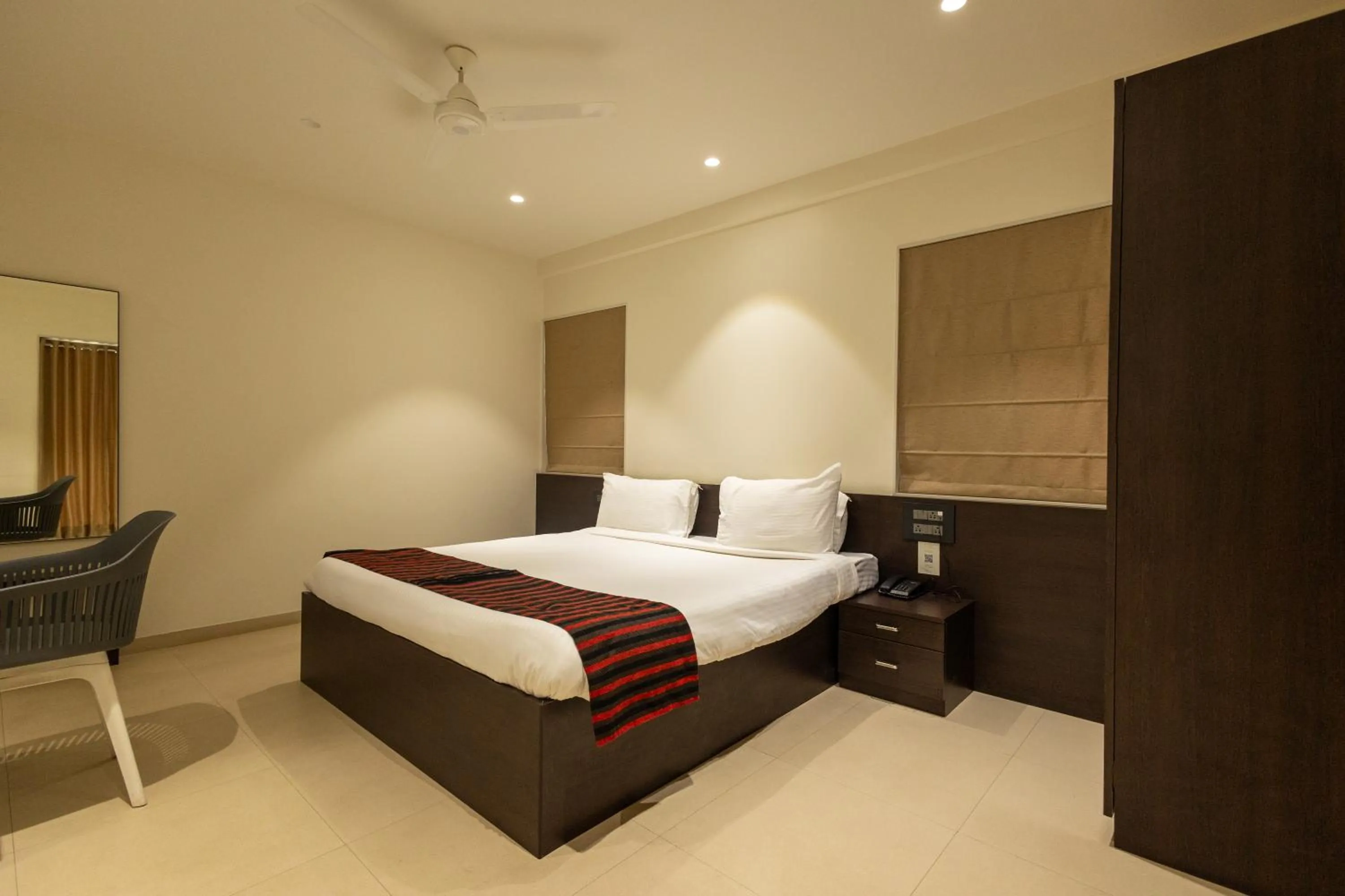 Bed in Freesia Residency by Express Inn