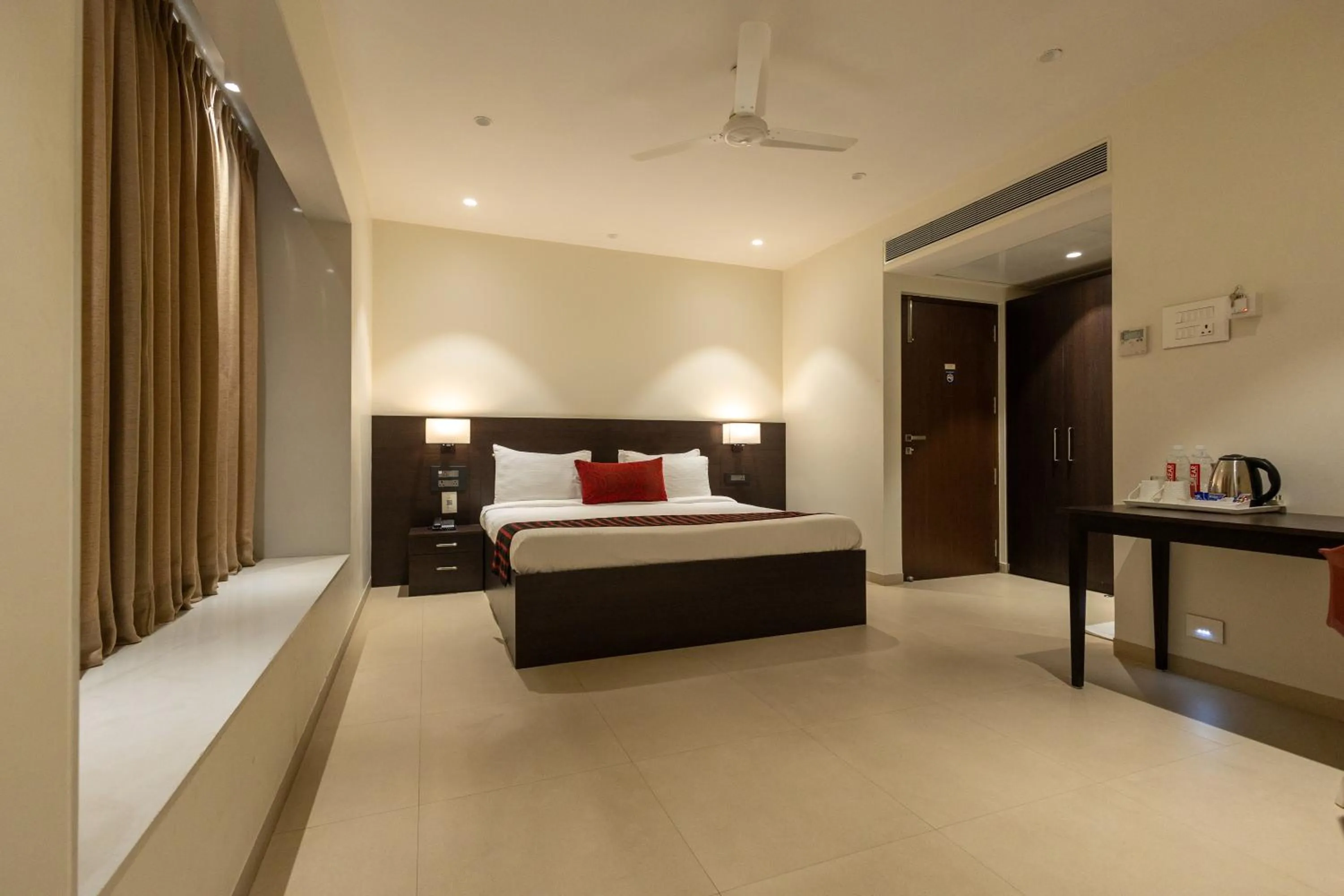 Bed in Freesia Residency by Express Inn