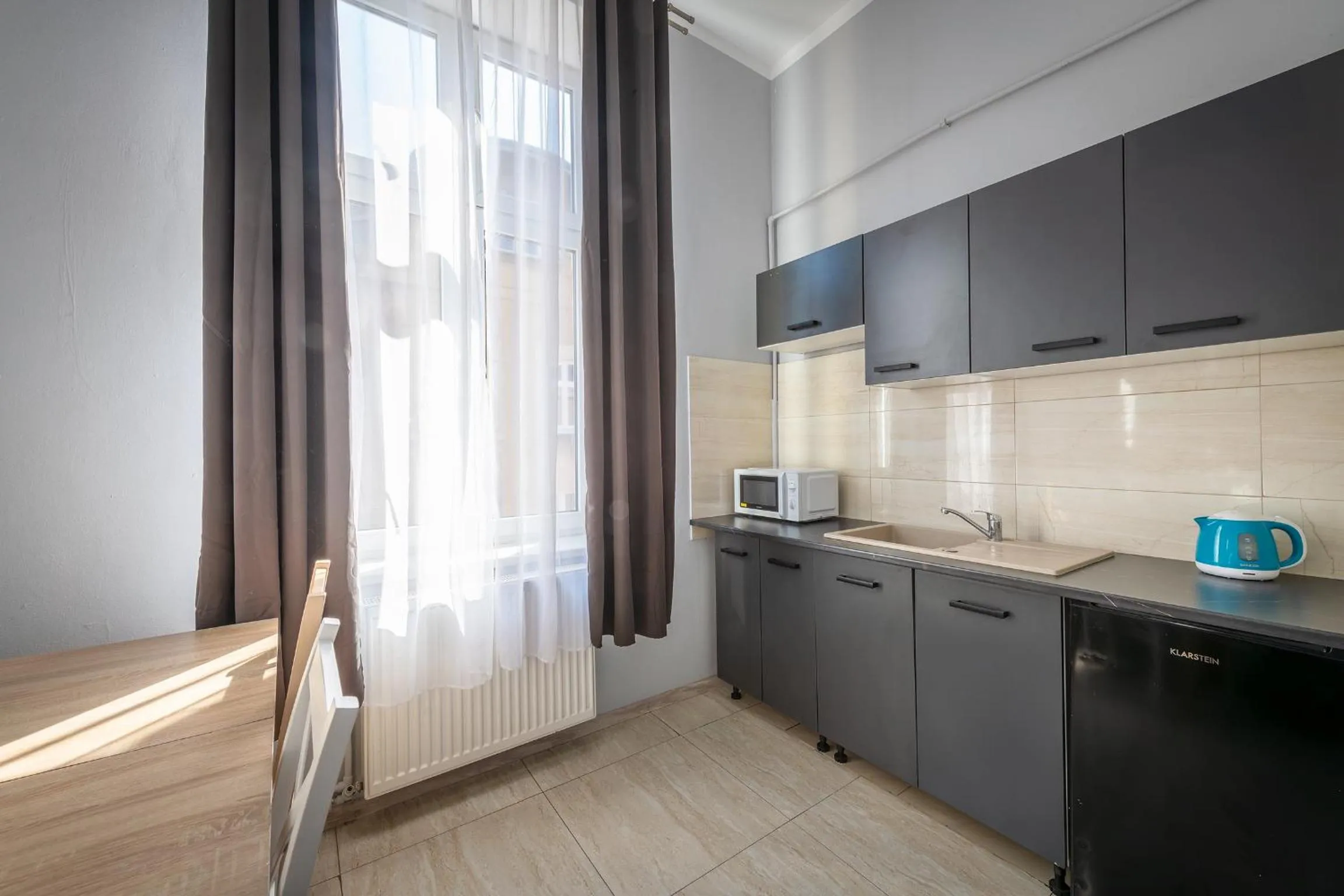 Kitchen or kitchenette in 70s Hostel