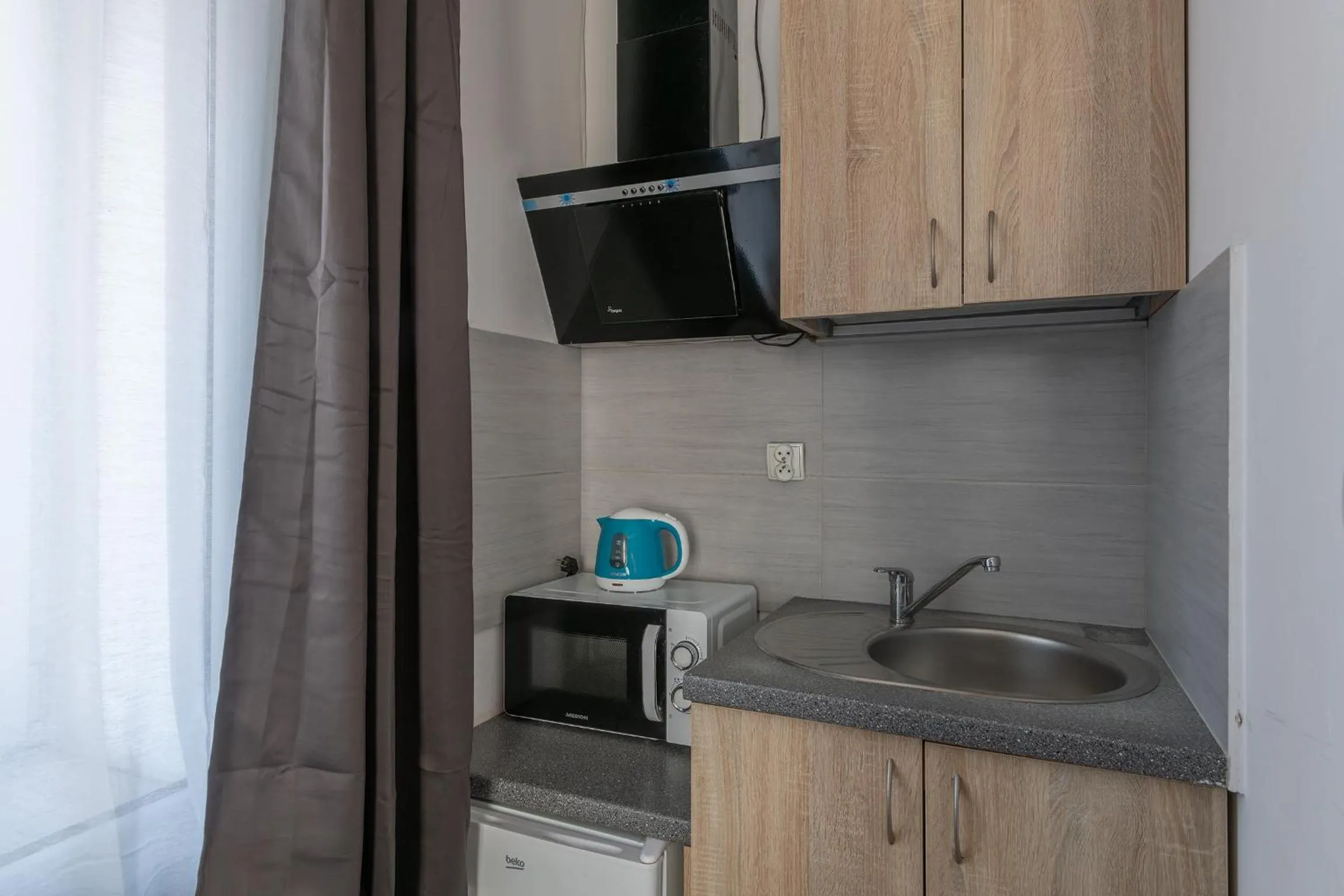 Kitchen or kitchenette in 70s Hostel