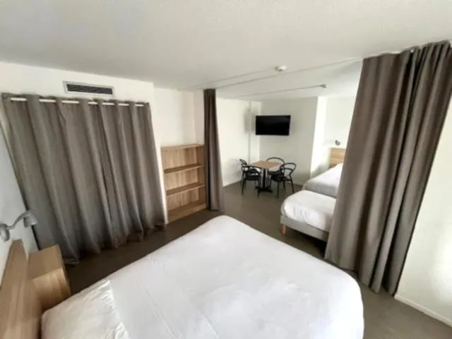 Photo of the whole room, Bed in Hôtel Les Rives Bleues