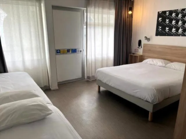 Photo of the whole room, Bed in Hôtel Les Rives Bleues