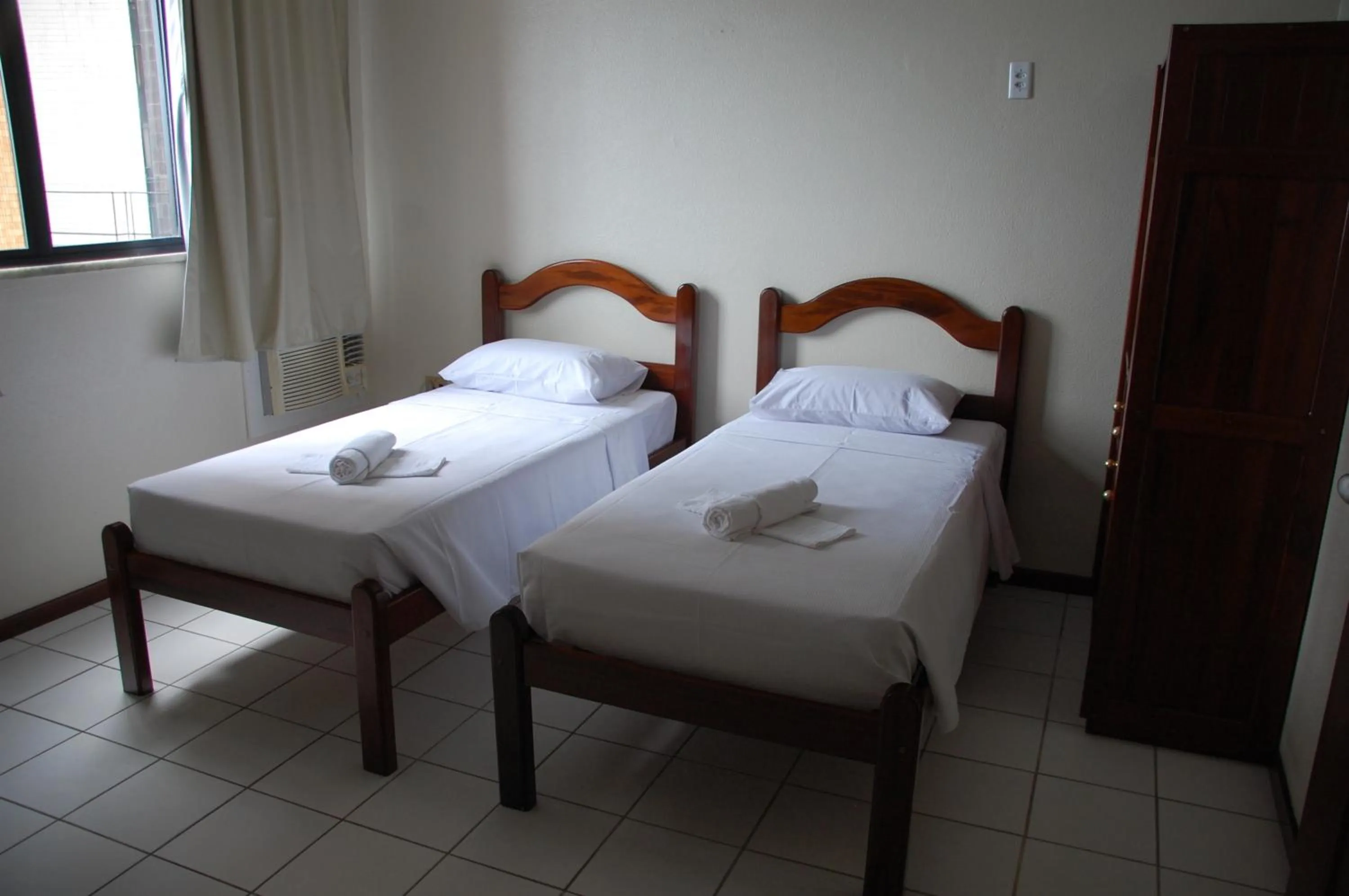 Bedroom in Netuno Beach Hotel
