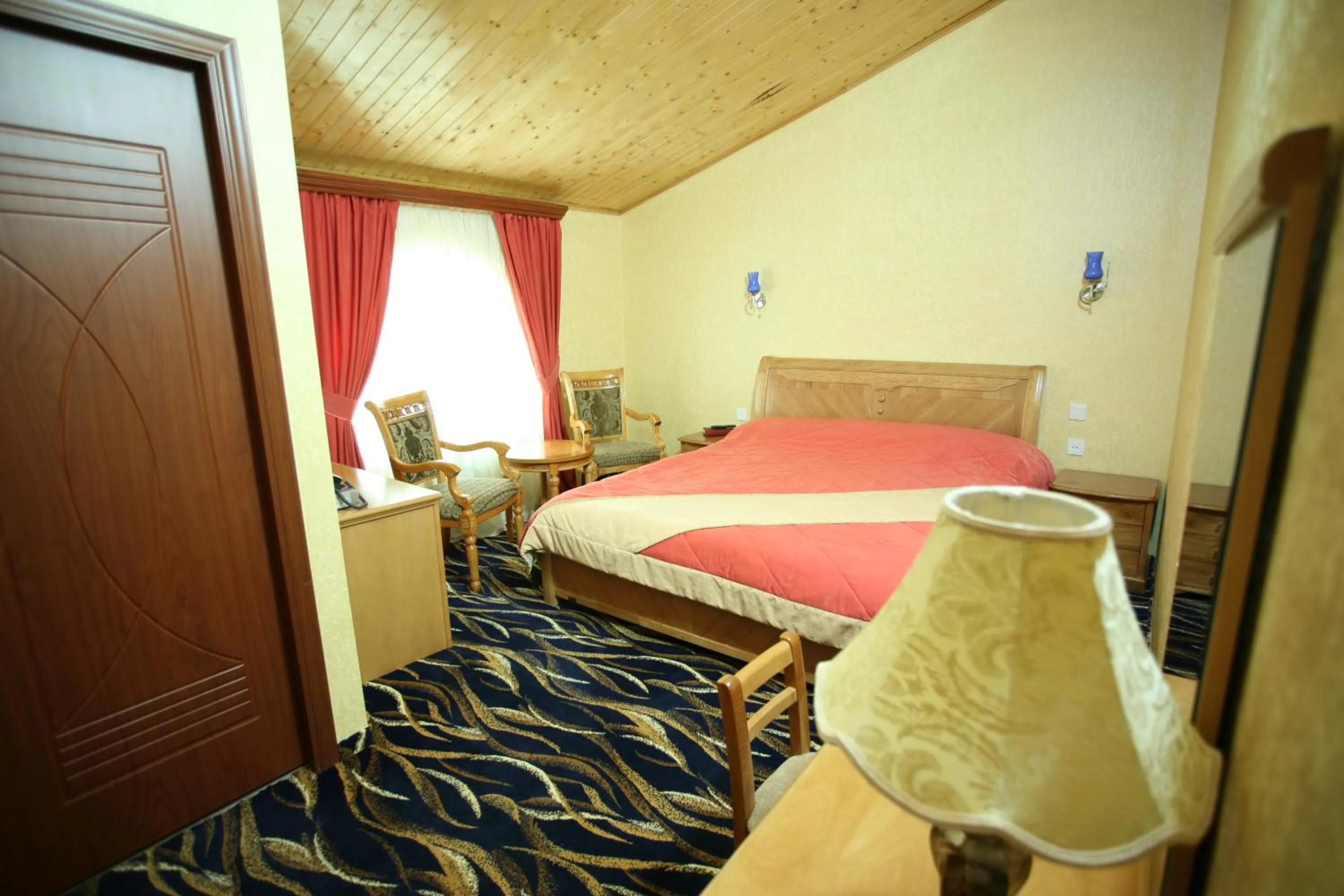 Bed in Nairi Hotel