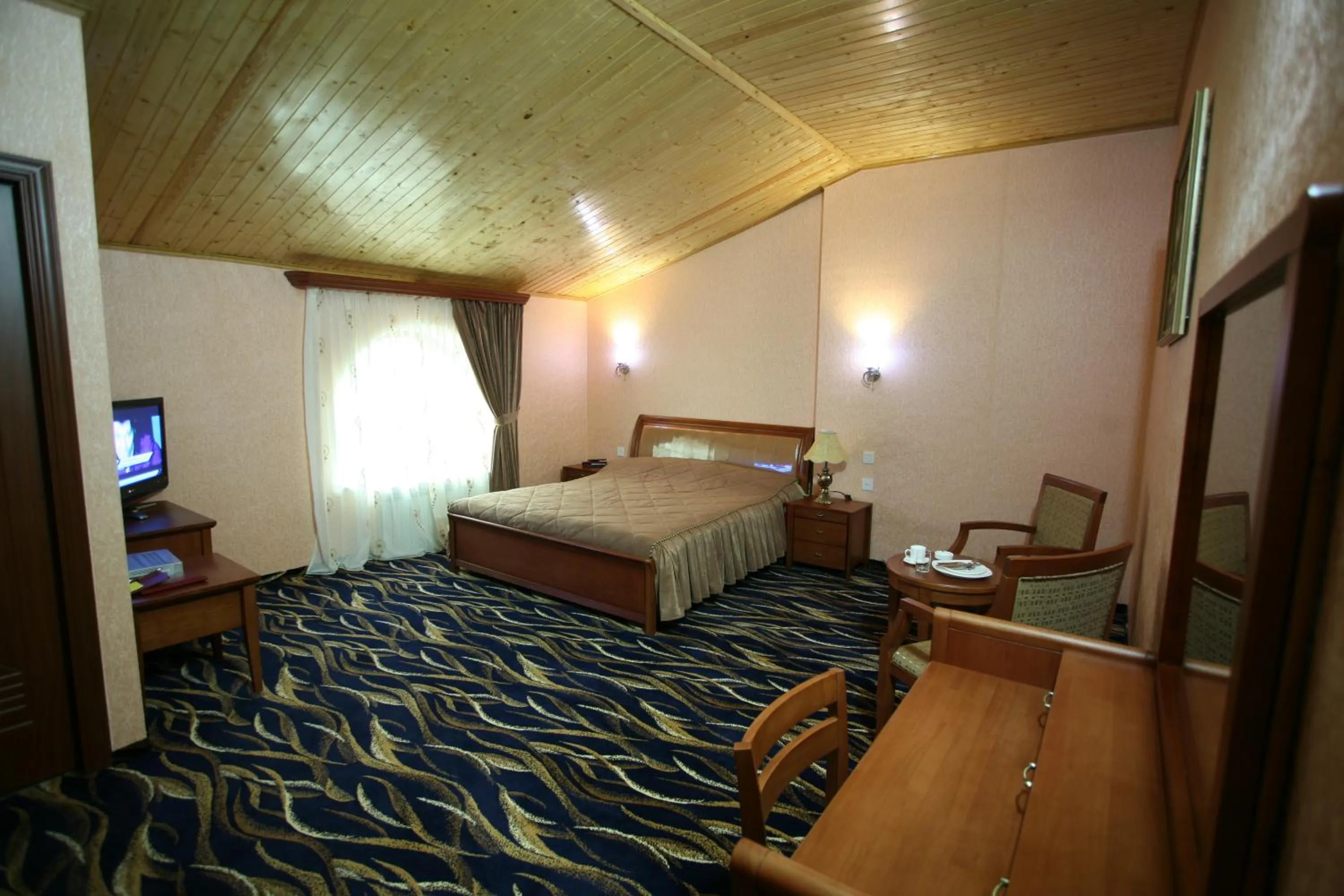 Bed in Nairi Hotel