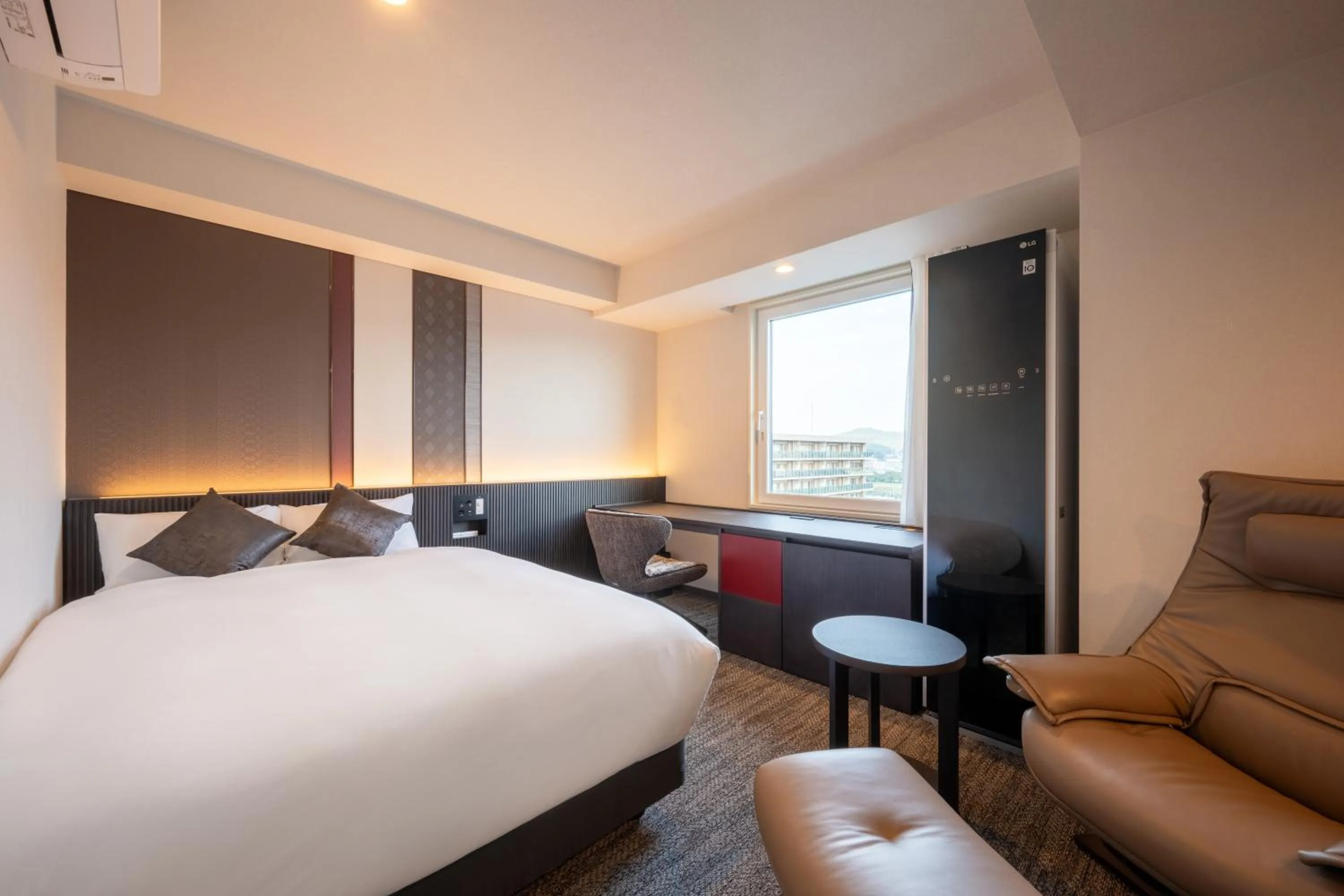 Bed in SAKURA PORT HOTEL