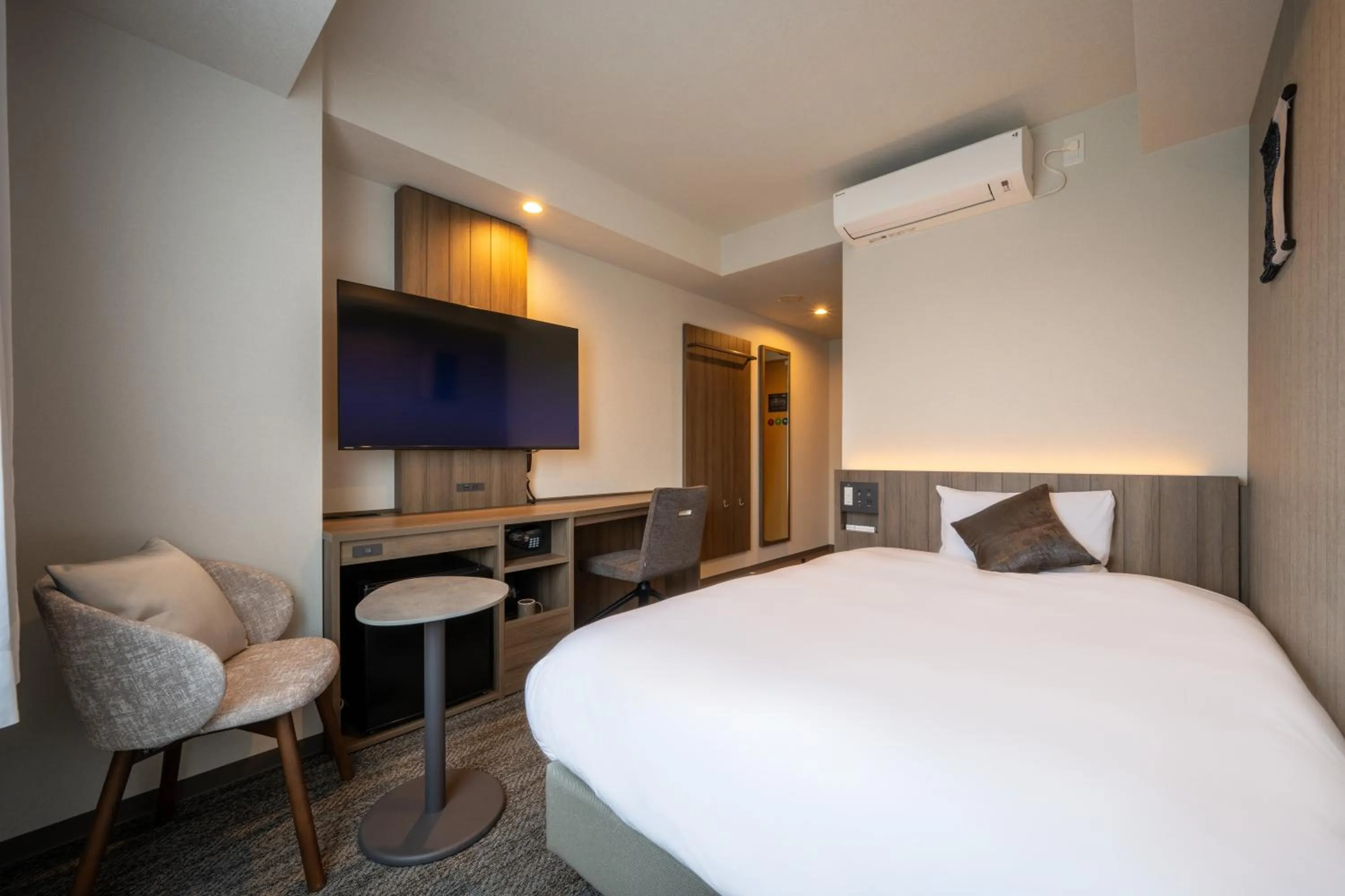 Bed in SAKURA PORT HOTEL