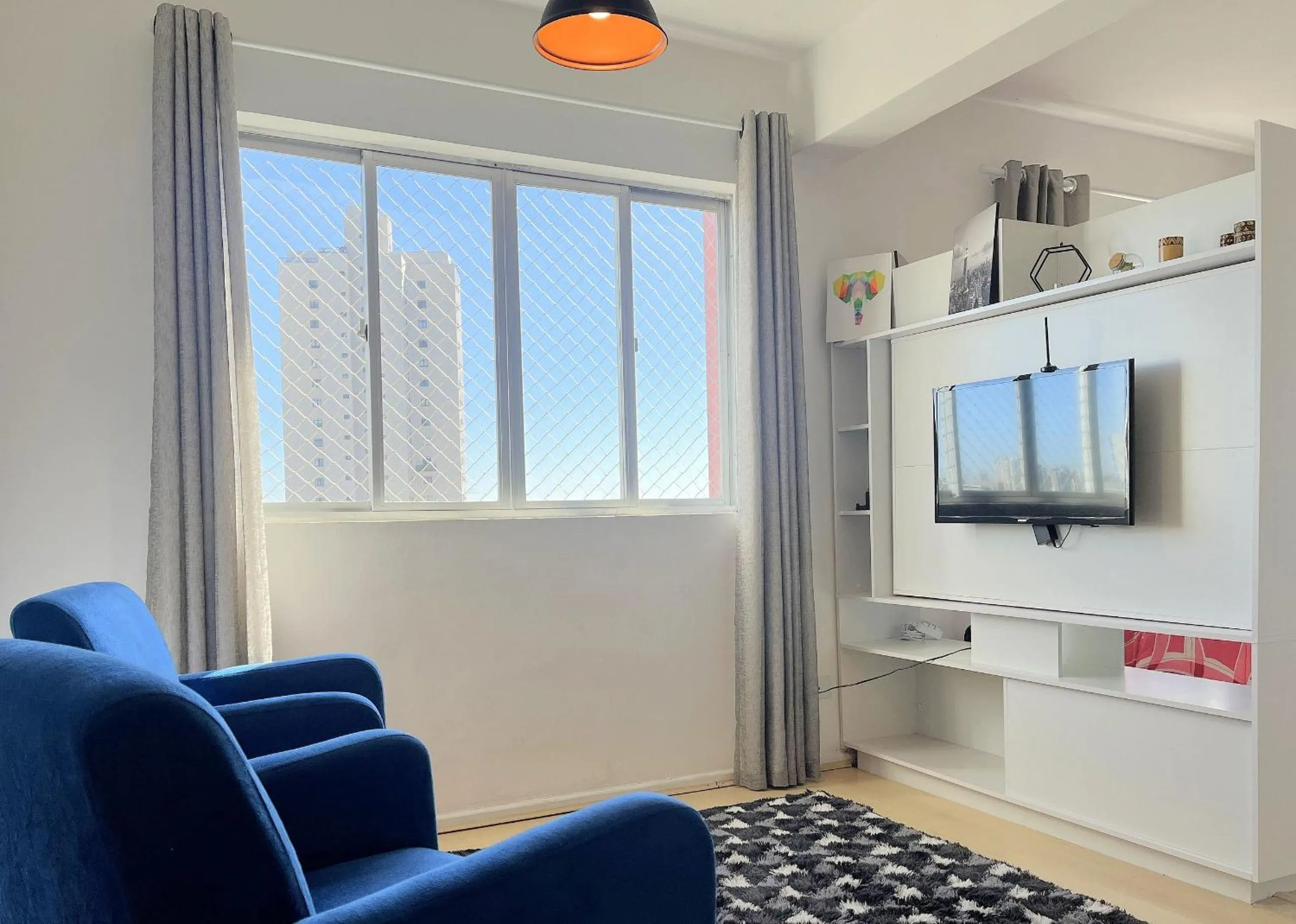 Living room in Prédio fantástico no bairro mais requisitado de Curitiba