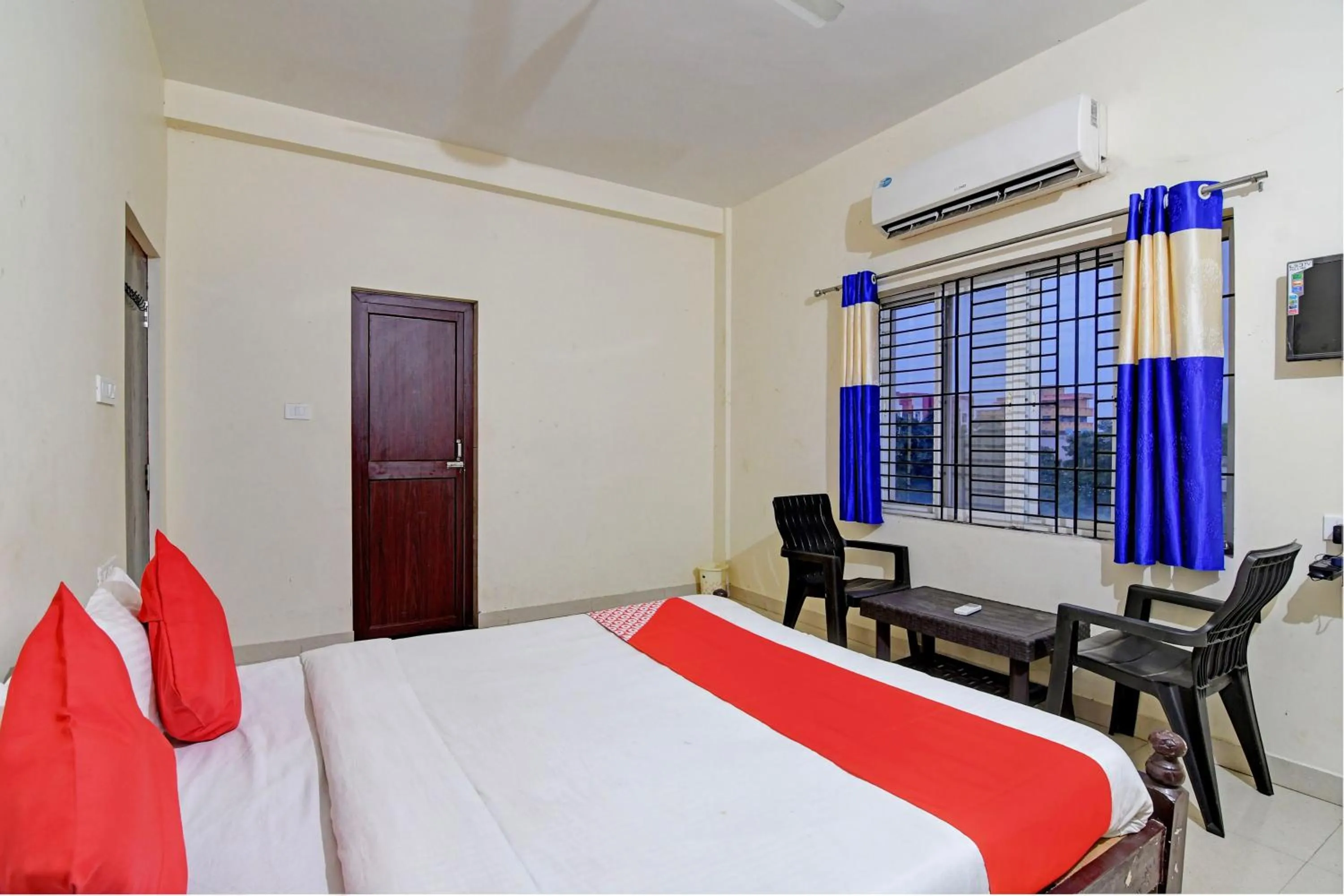 Bedroom in Hotel O Swiss stay