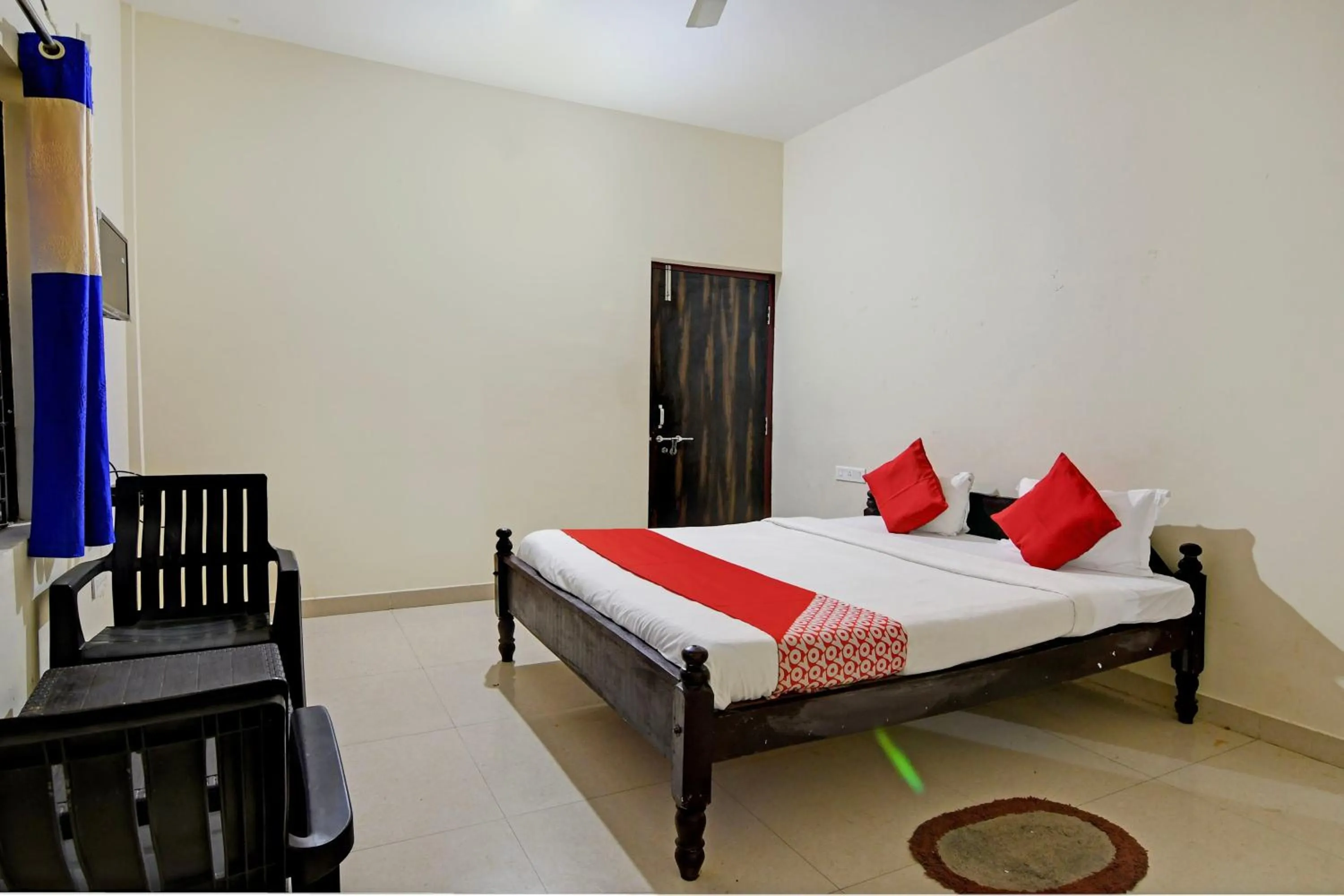 Bedroom in Hotel O Swiss stay