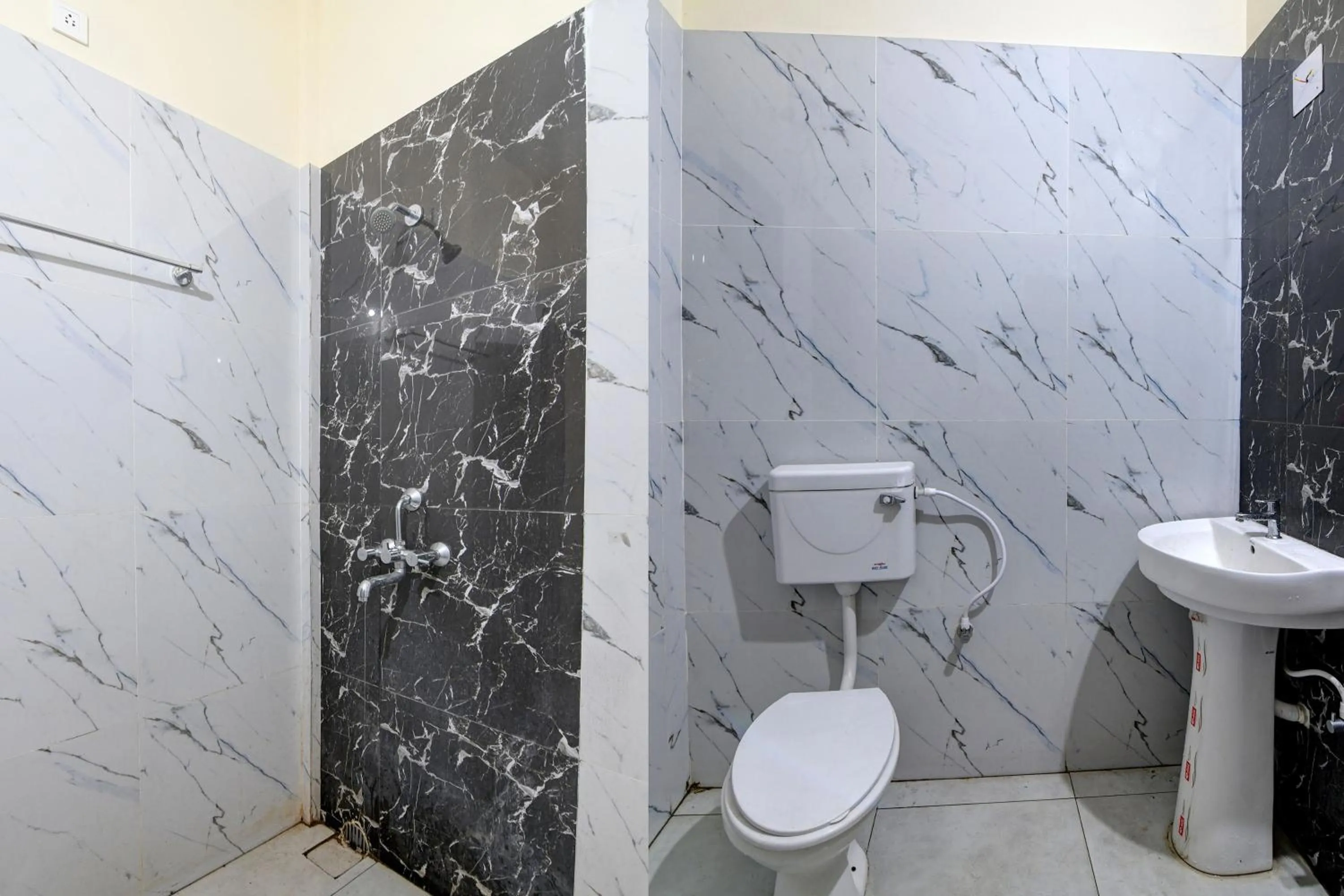 Bathroom in Hotel O Swiss stay