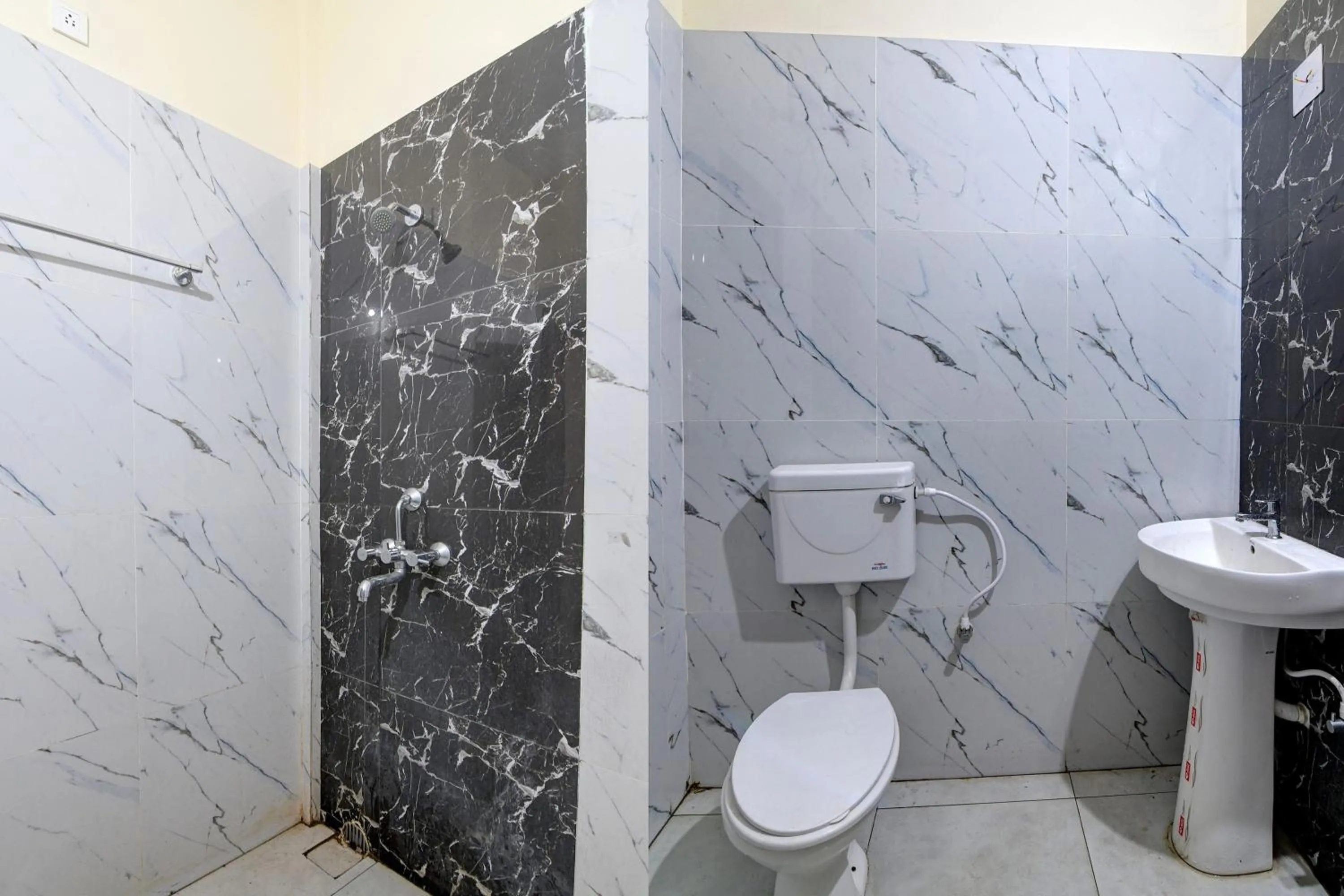 Bathroom in Hotel O Swiss Stay