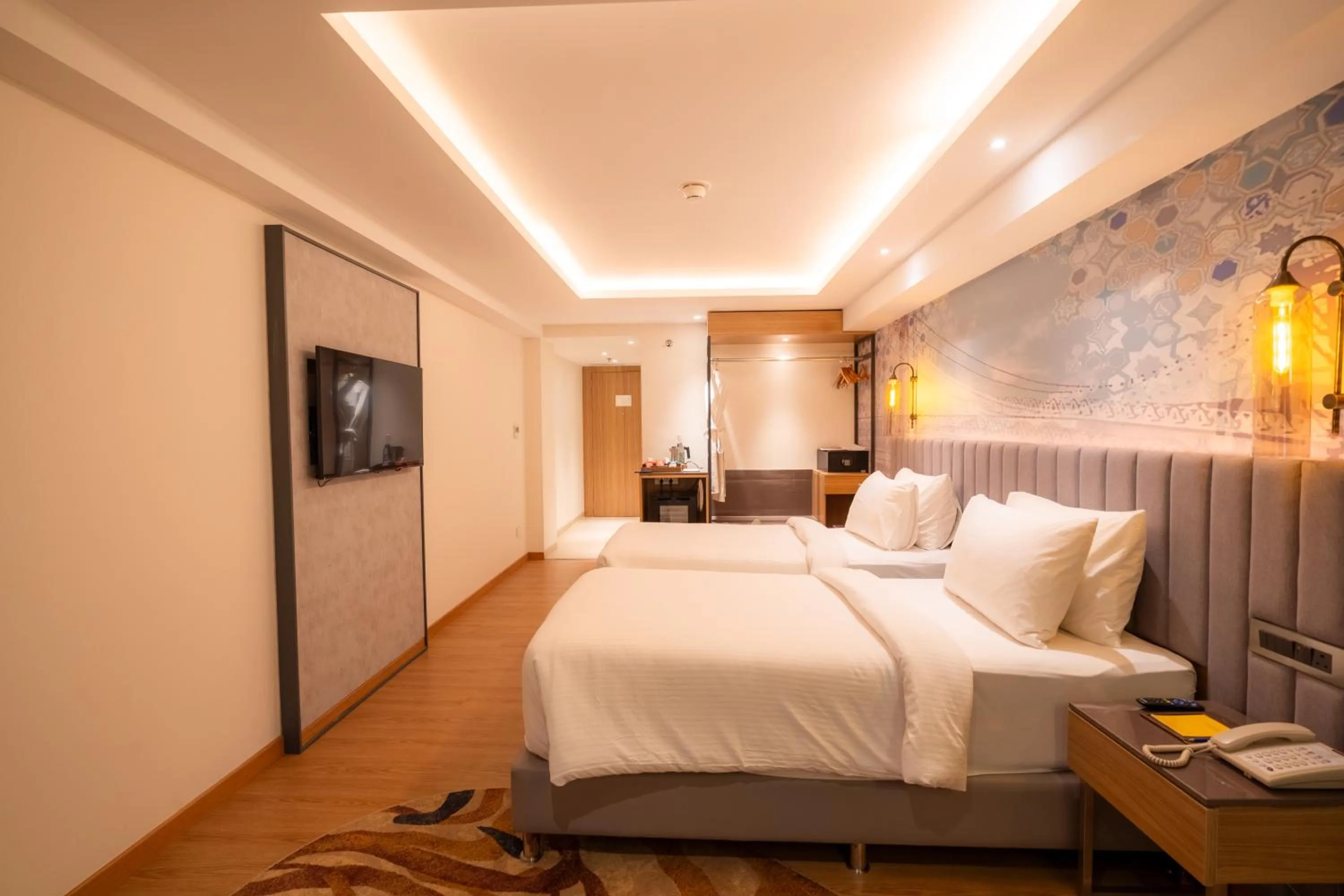 Photo of the whole room, Bed in Golden Tulip Bhopal