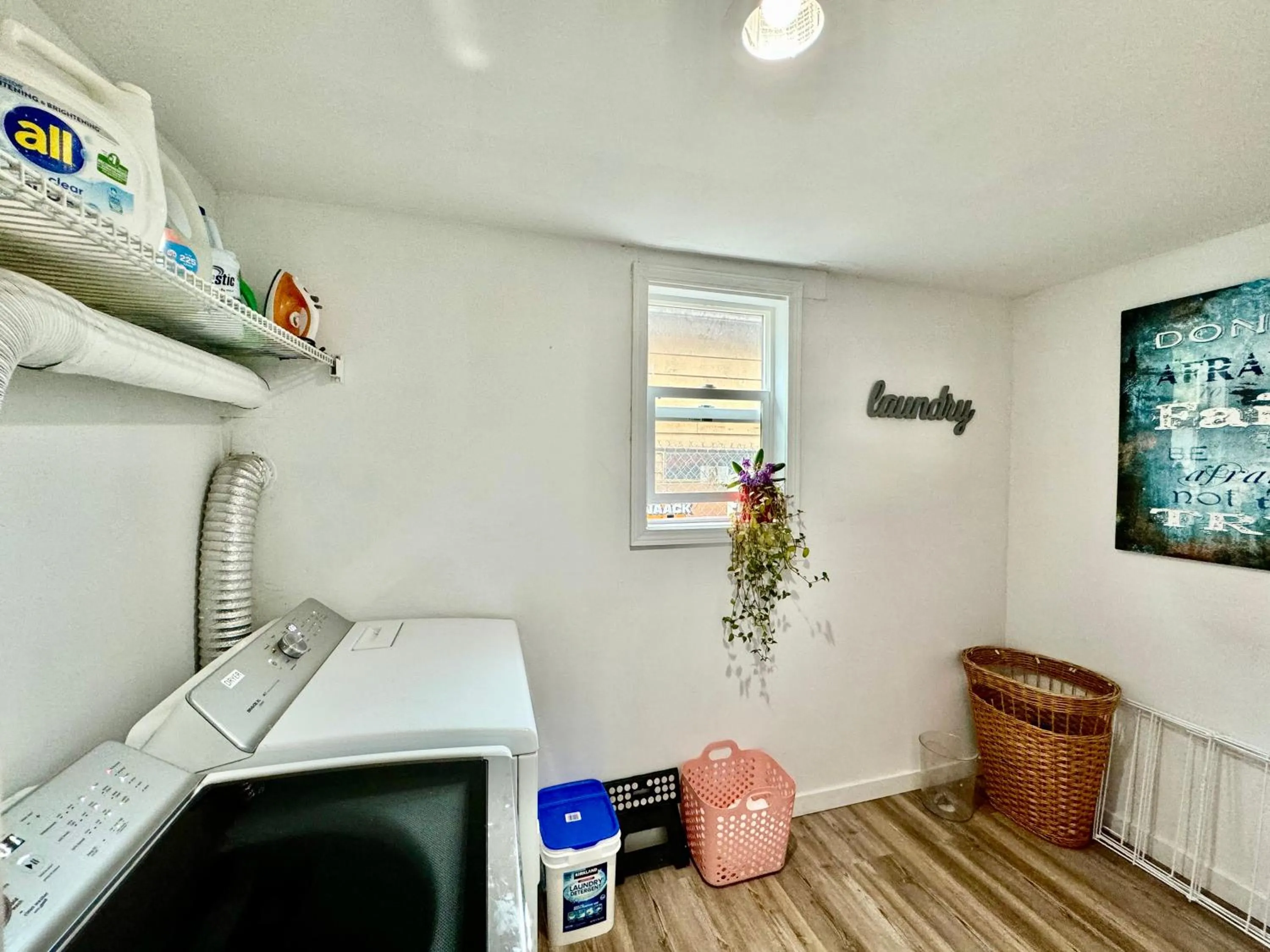 washing machine in Tiny Private Room at the Upper Level of a Big House with Shared Bathroom