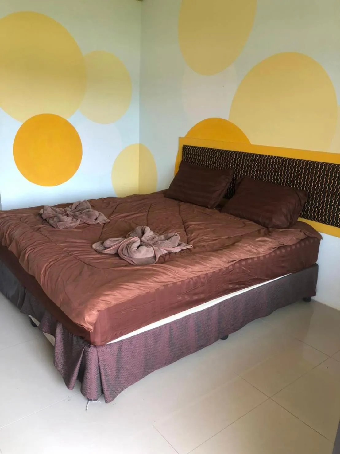 Bed in Petpumok Wangnamkhiao Hotel