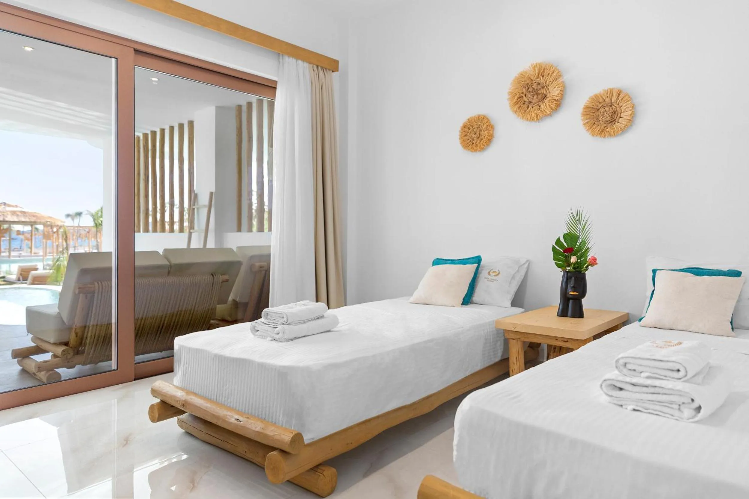 Bed in Alia Beachfront Suites and Spa