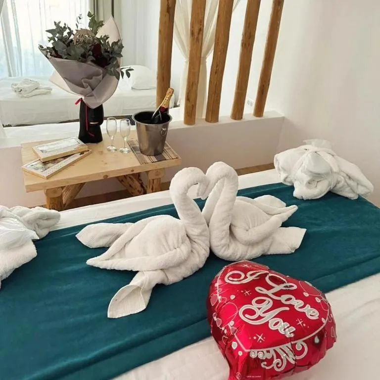 Bed in Alia Beachfront Suites and Spa