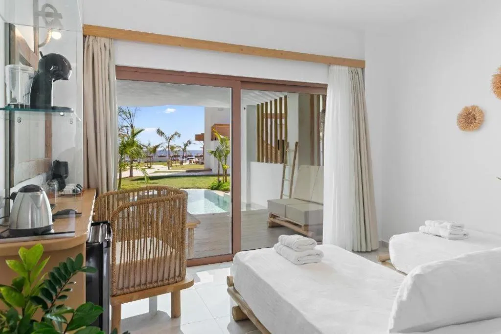 Bed in Alia Beachfront Suites and Spa