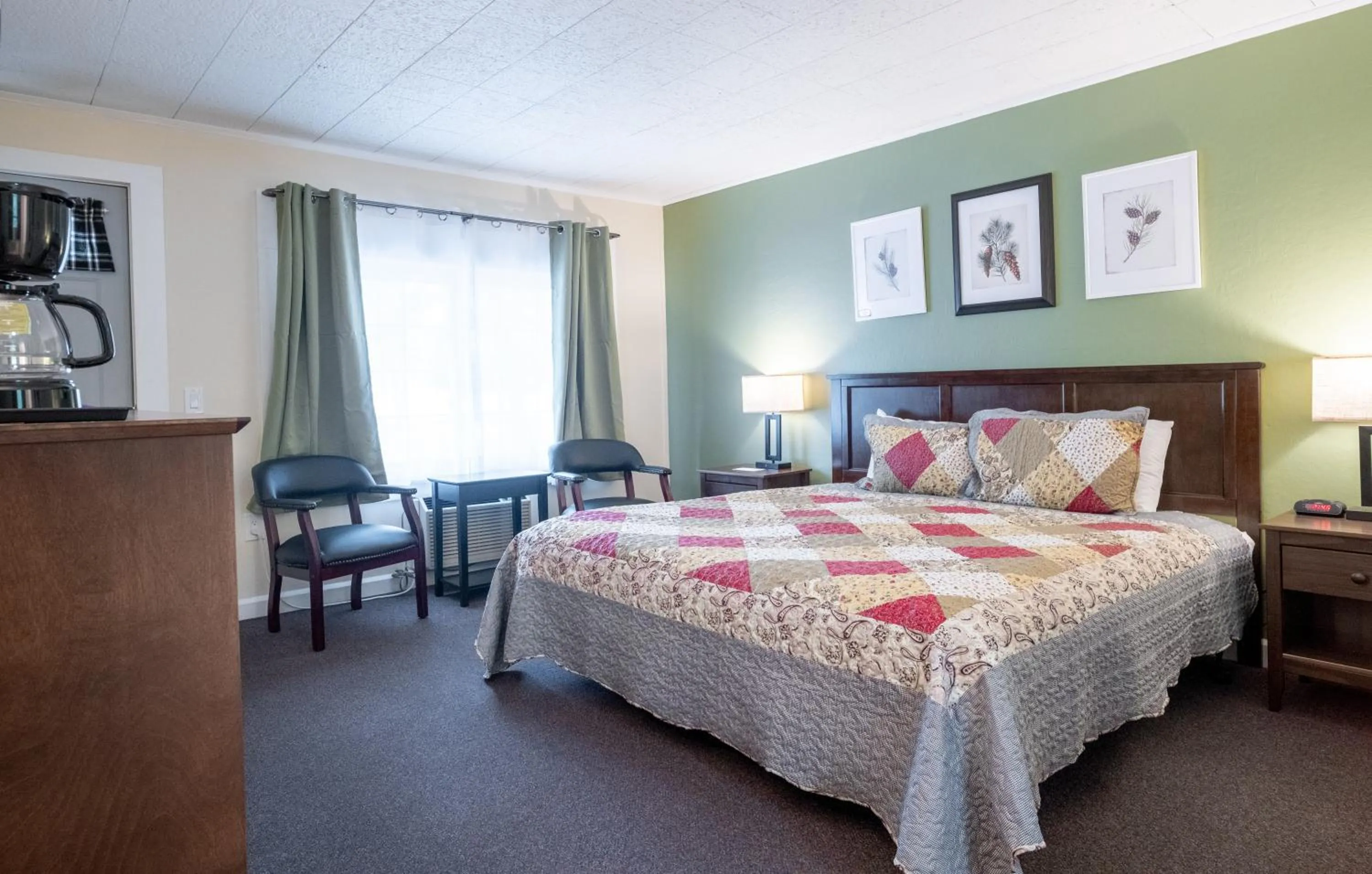 Bed in Acadia Pines Motel