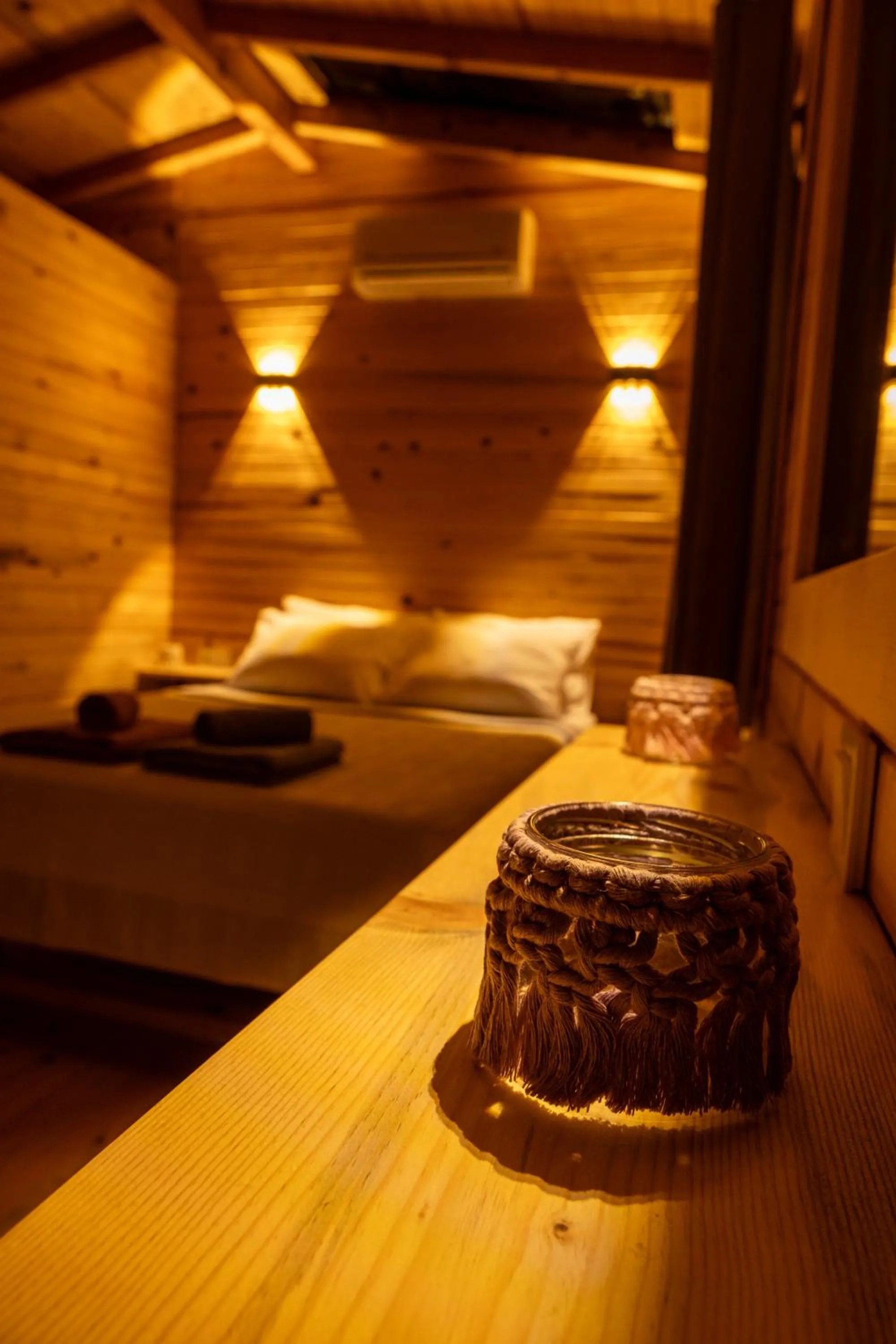 Bed in Goat Bungalow and Camping