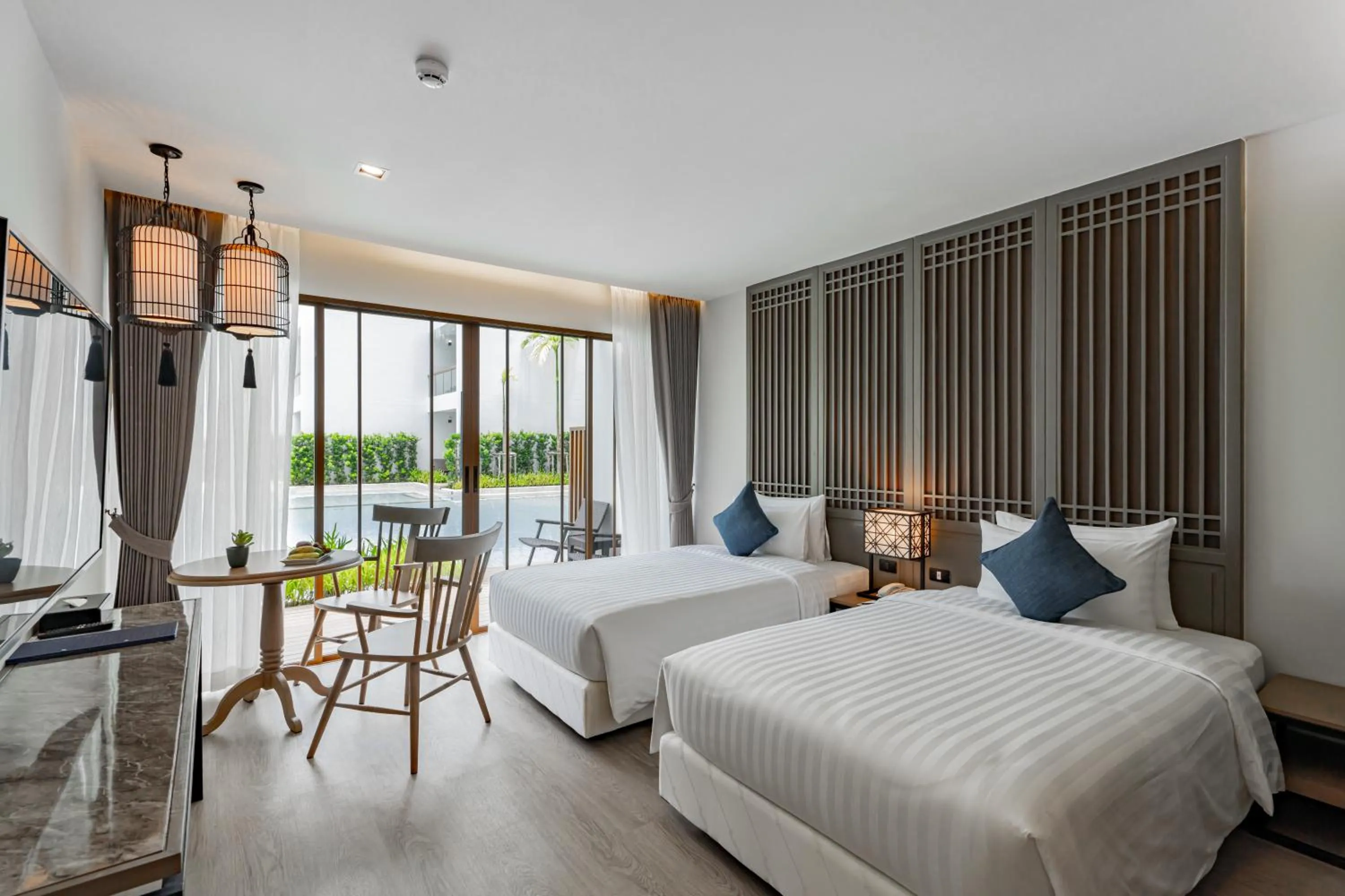Bed in Bella Nara Phuket Naiyang Beach
