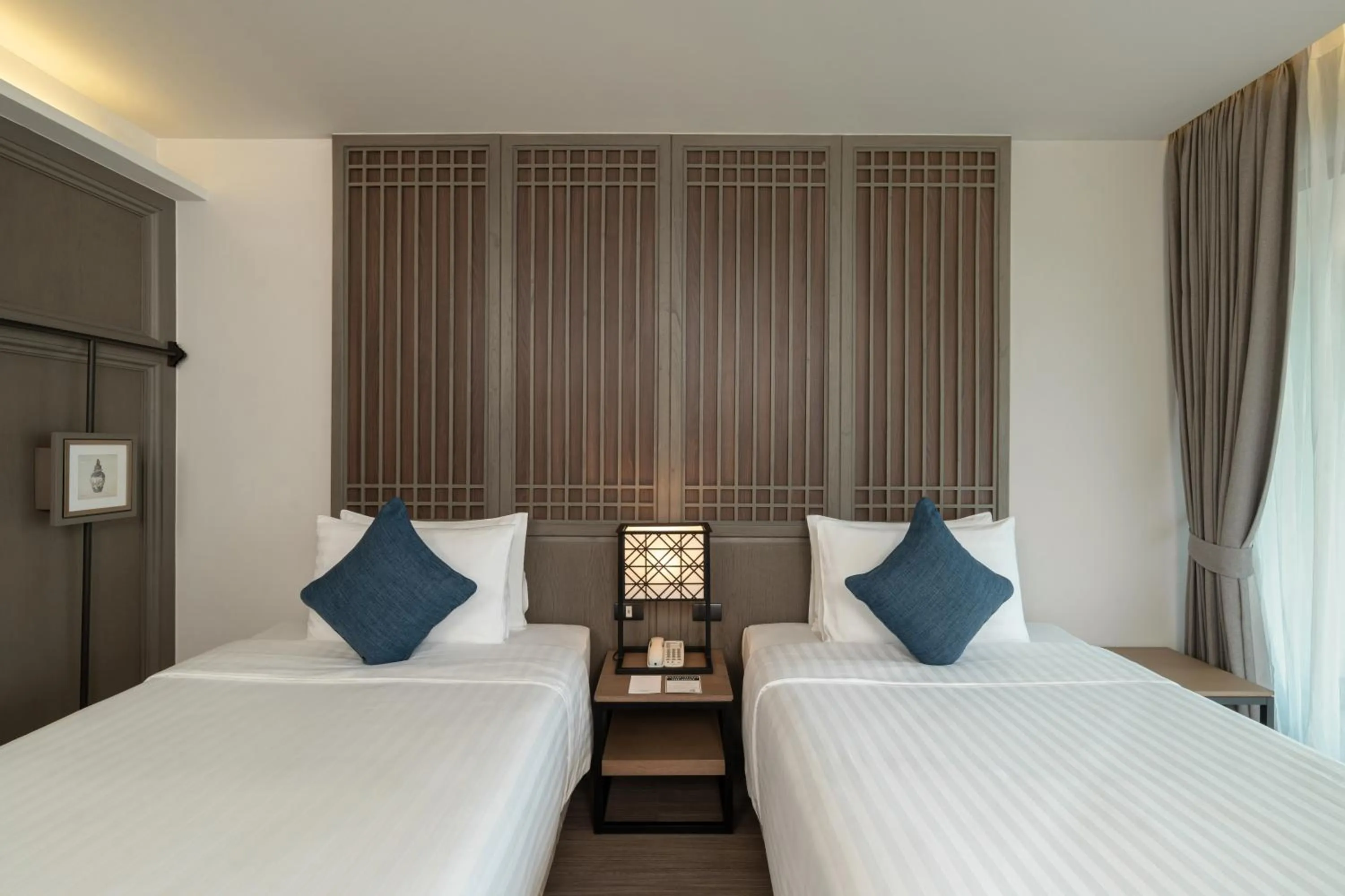 Bed in Bella Nara Phuket Naiyang Beach