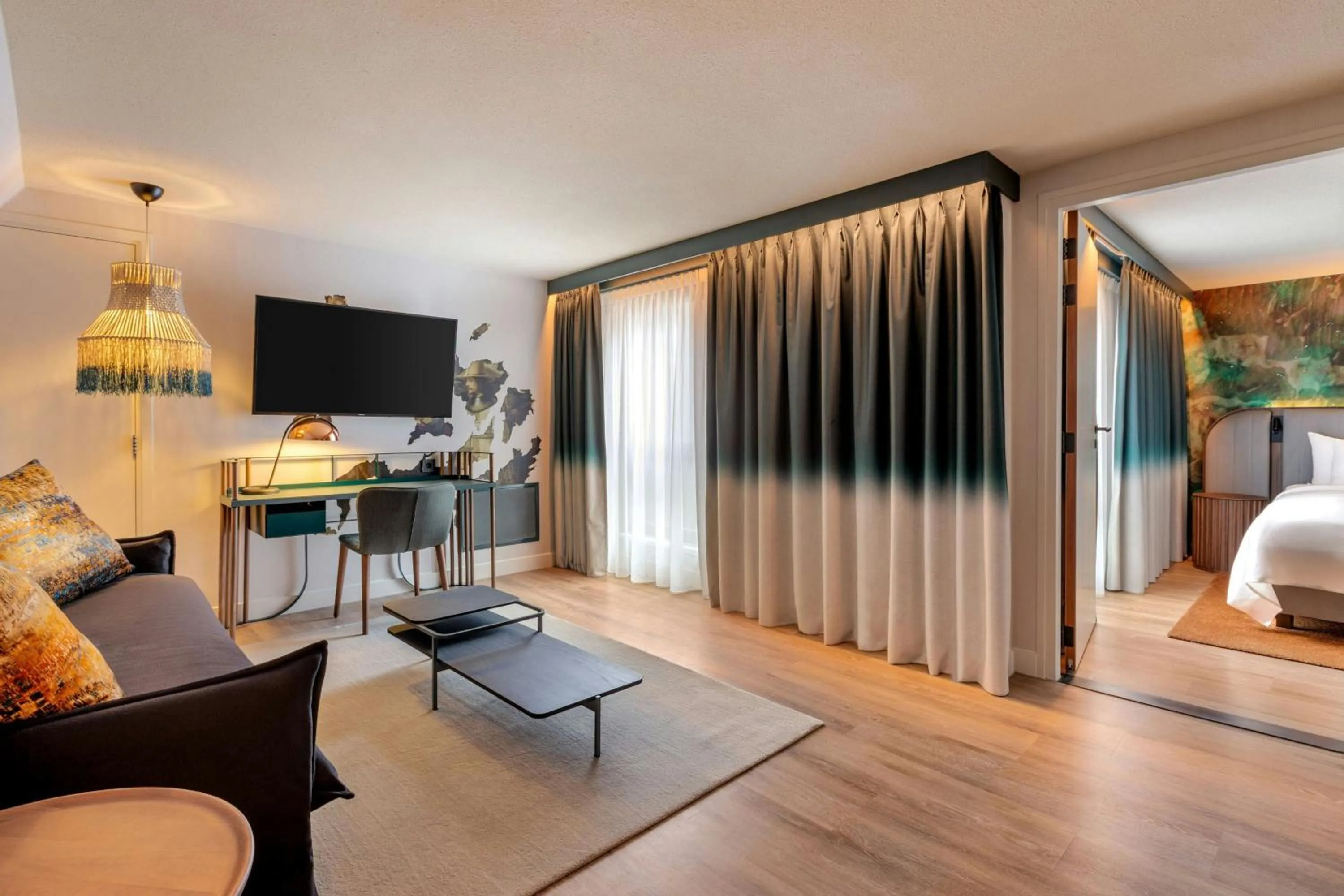 Living room, Bed in Renaissance Amsterdam Hotel