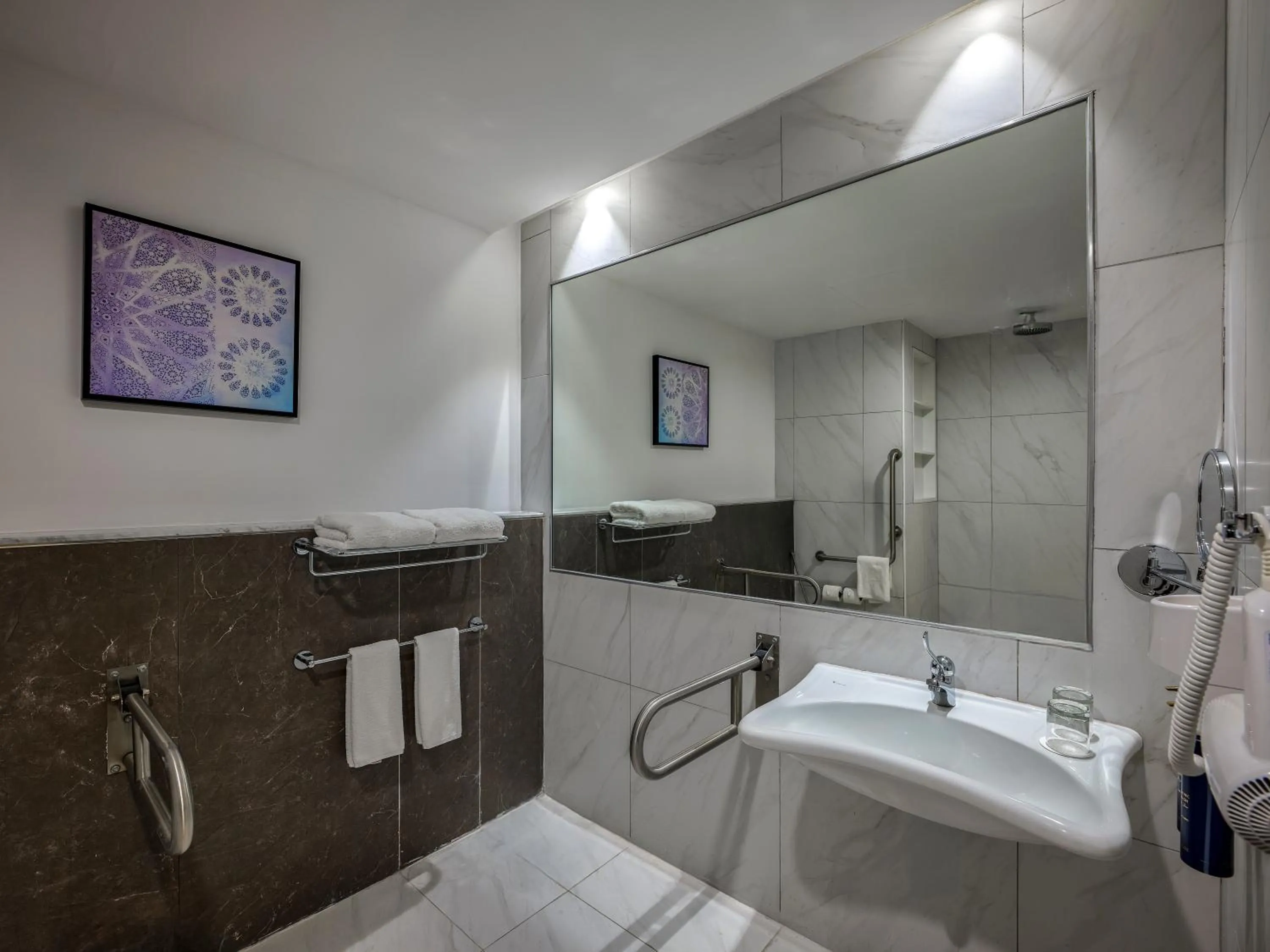 Toilet in Wirgan Al Noor, Tapestry Collection by Hilton