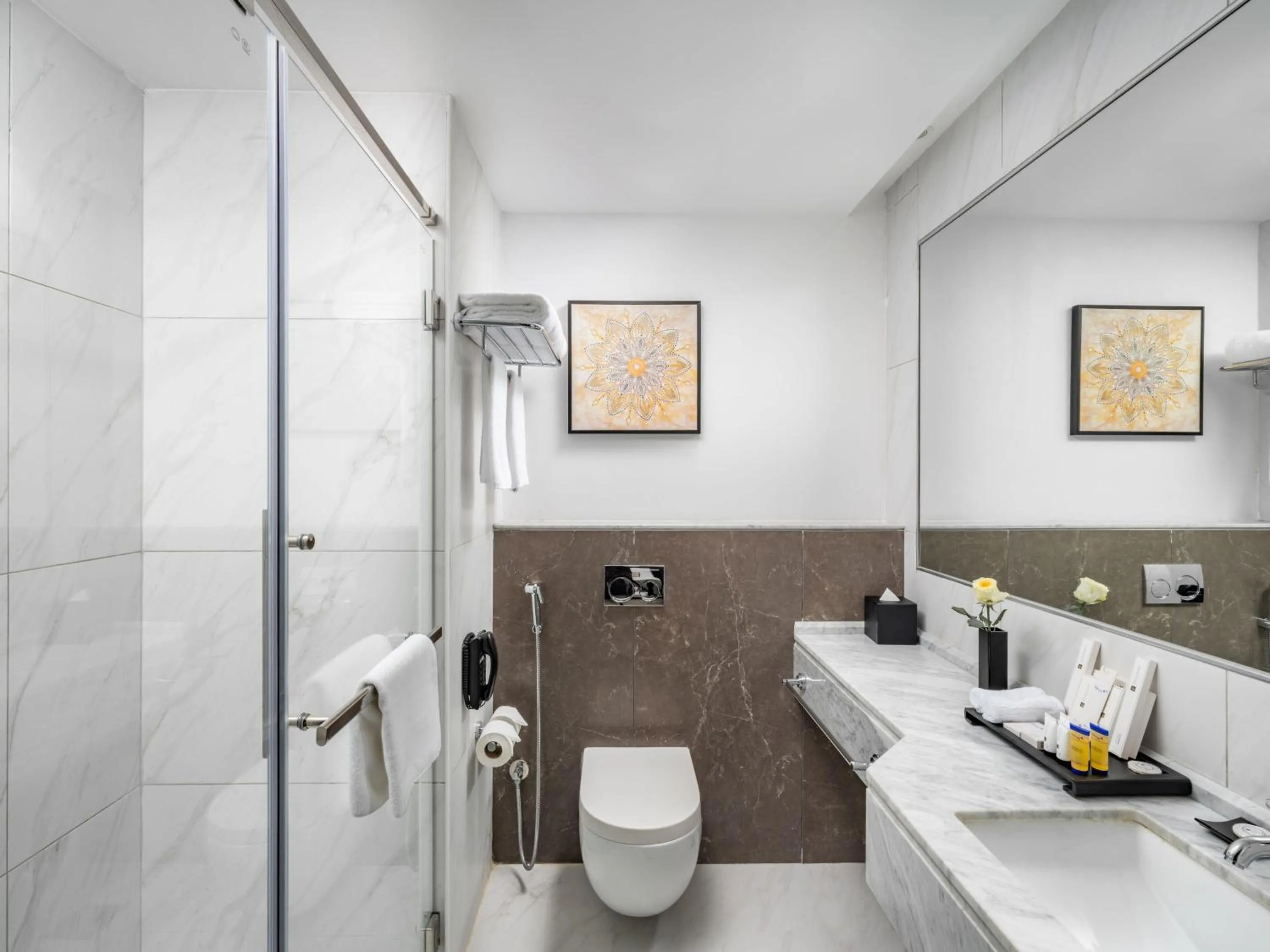 Bathroom in Wirgan Al Noor, Tapestry Collection by Hilton