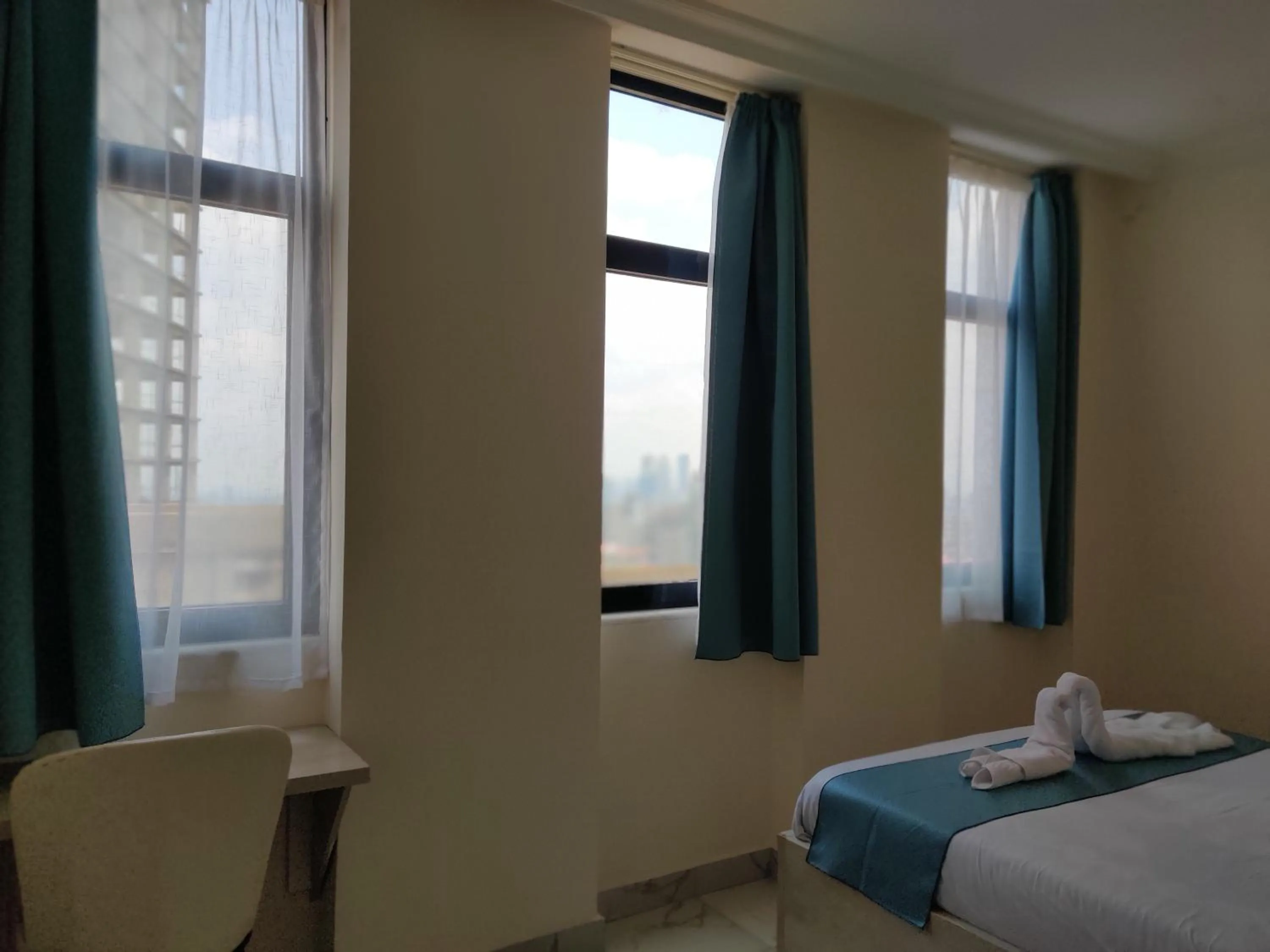 Bed in Glam Hotel Addis Ababa