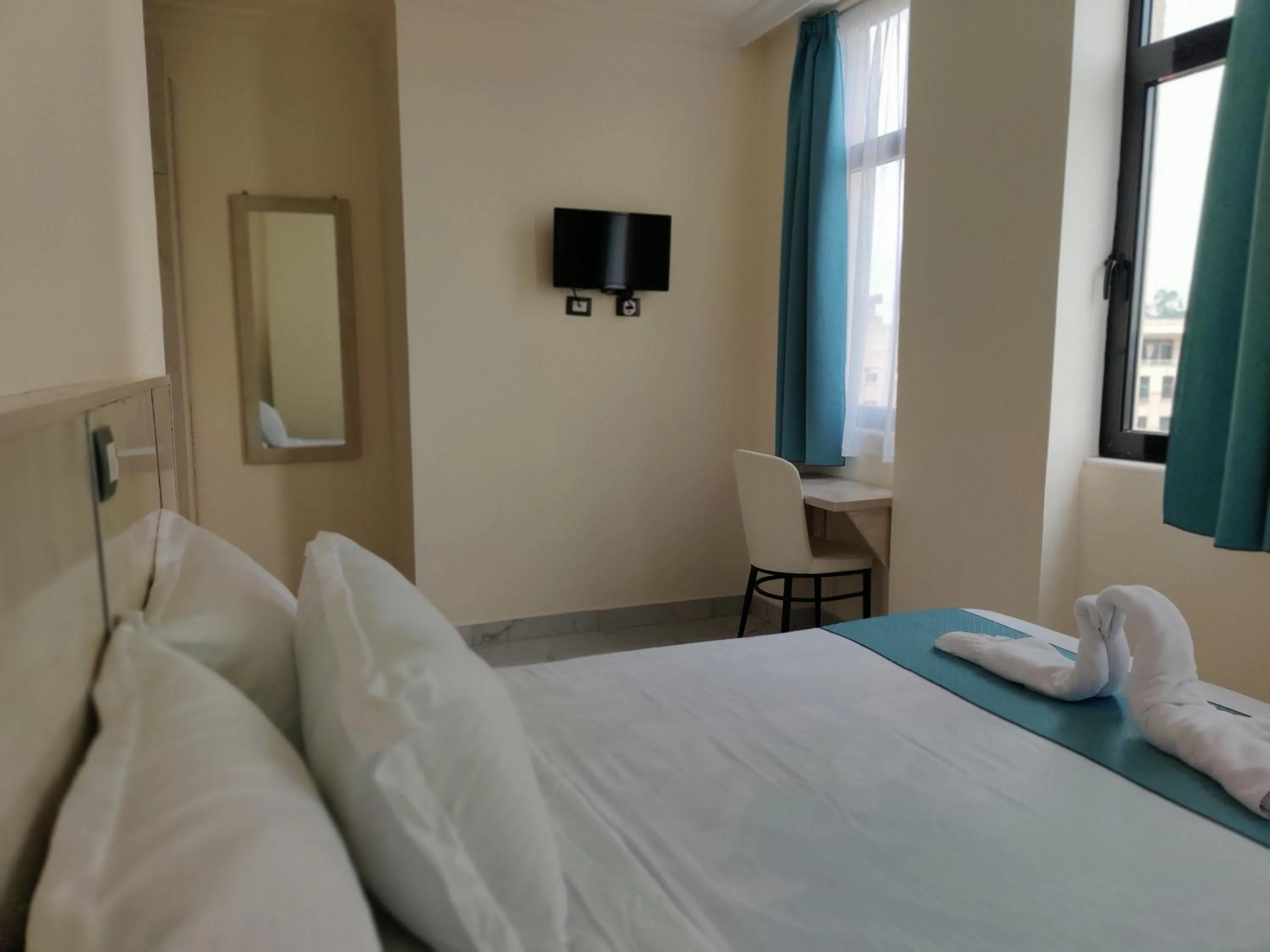 Bed in Glam Hotel Addis Ababa