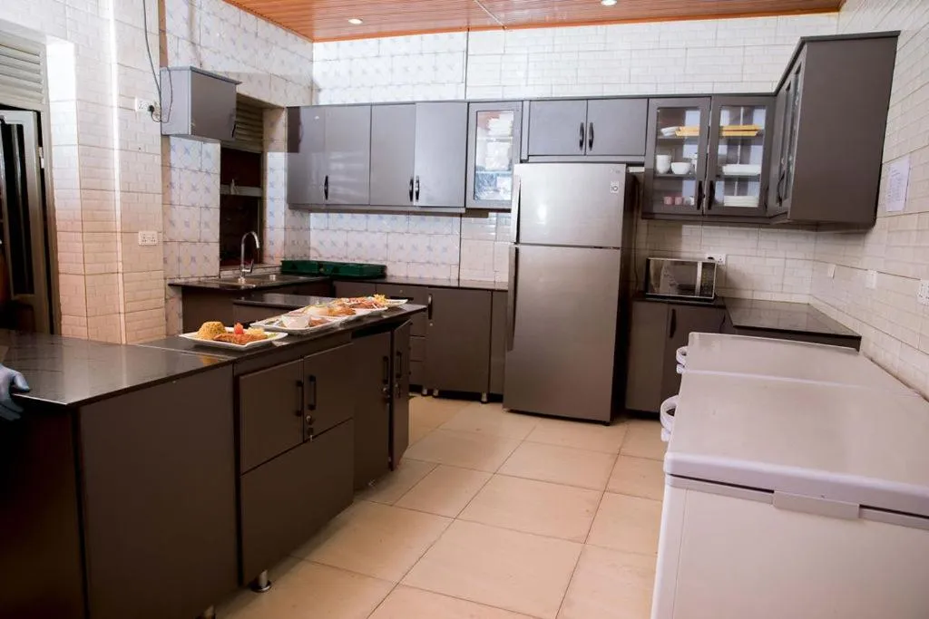 Kitchen or kitchenette in Velvet Suites