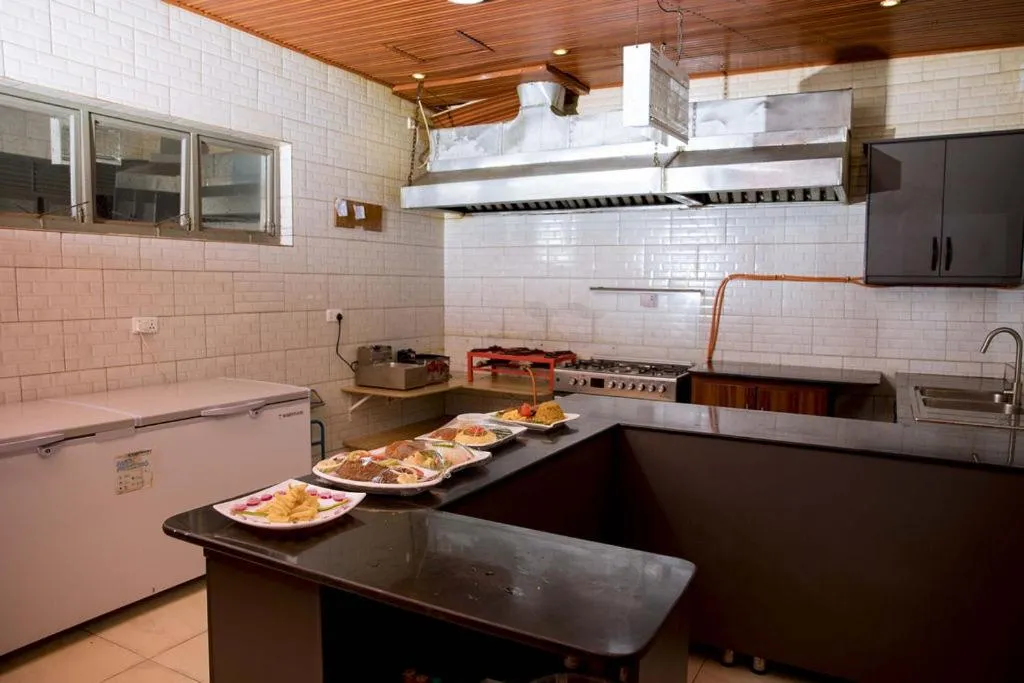 Kitchen or kitchenette in Velvet Suites