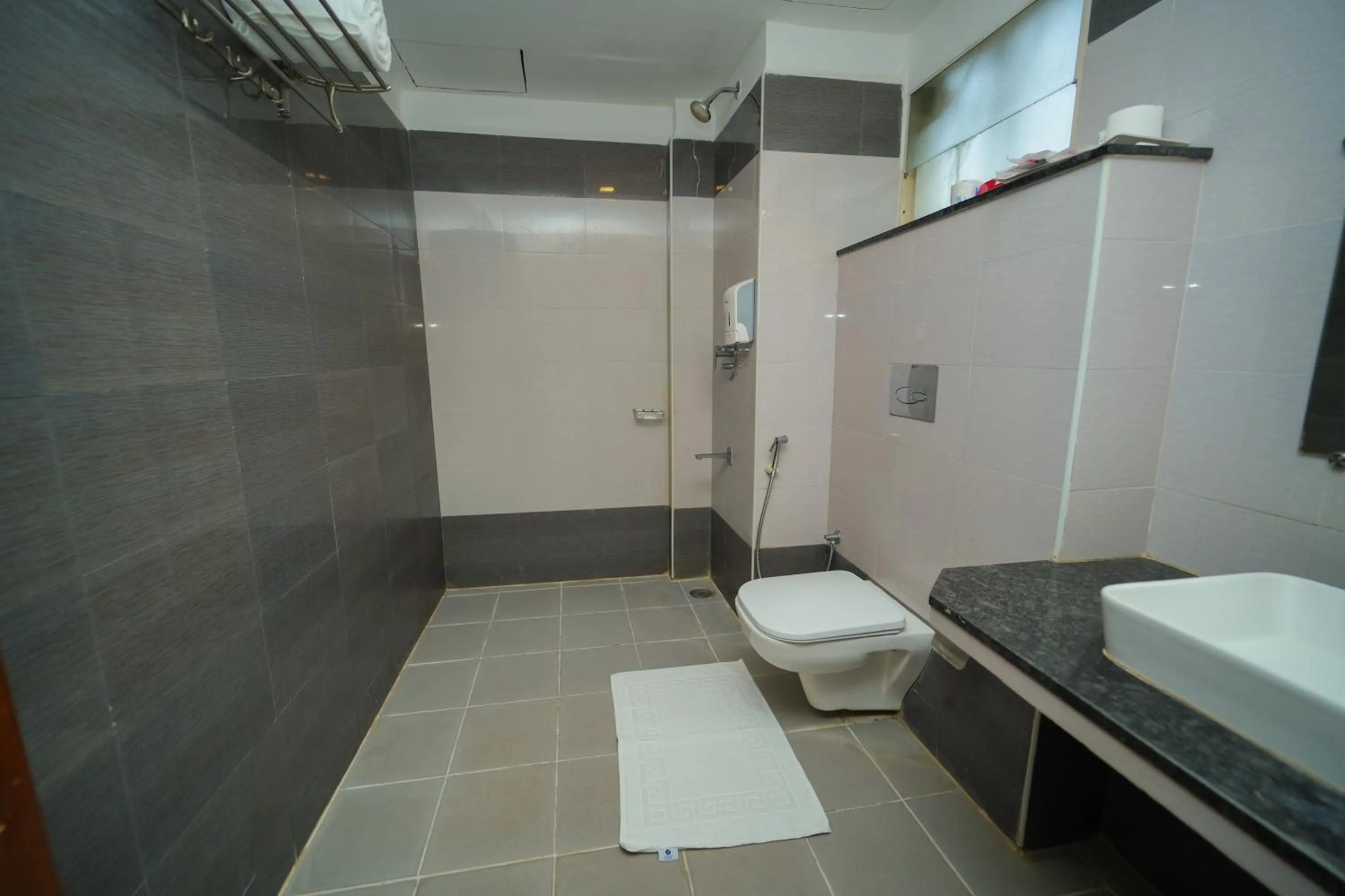 Shower in Zip by Spree Hotels Mangala International