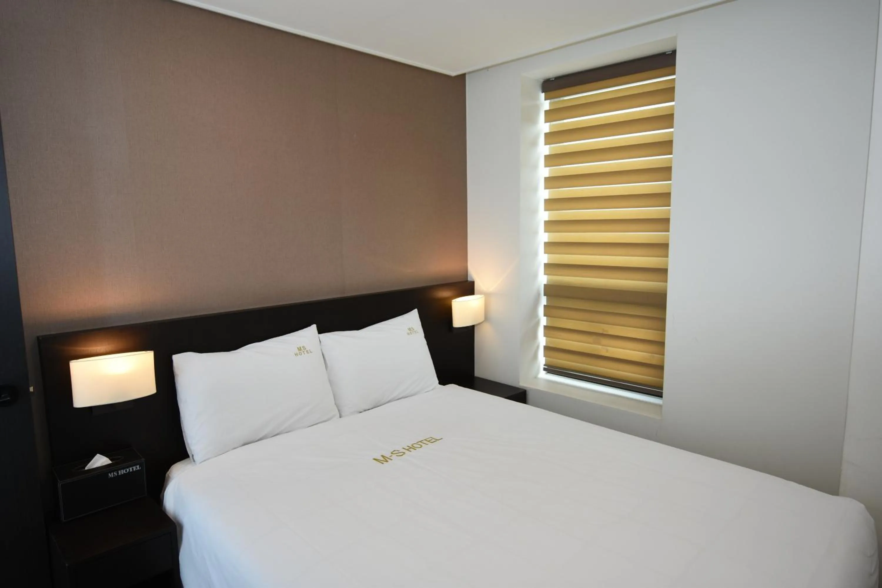 Bed in MS Hotel Haeundae