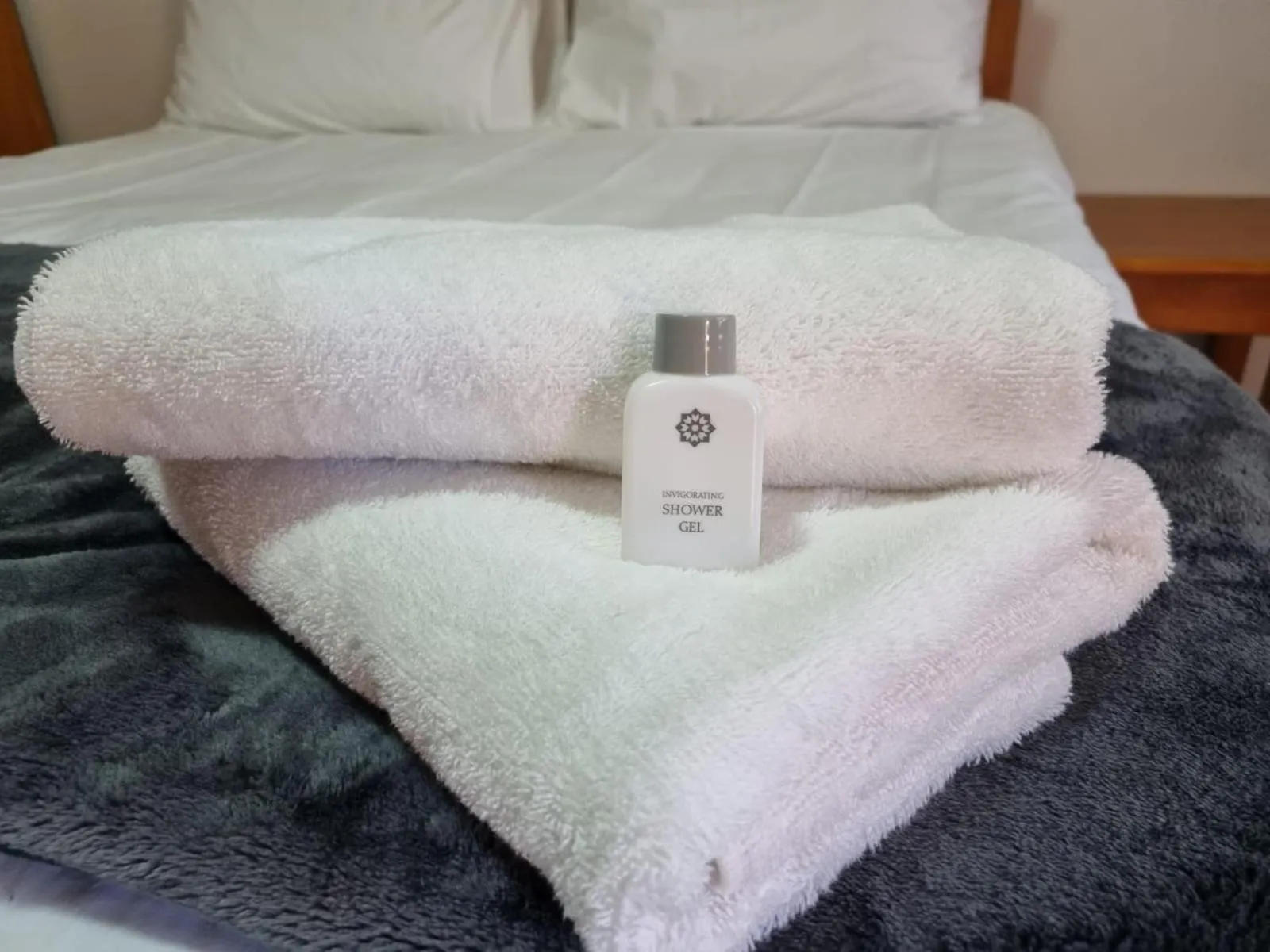 towels, Bed in Emerald Guesthouse