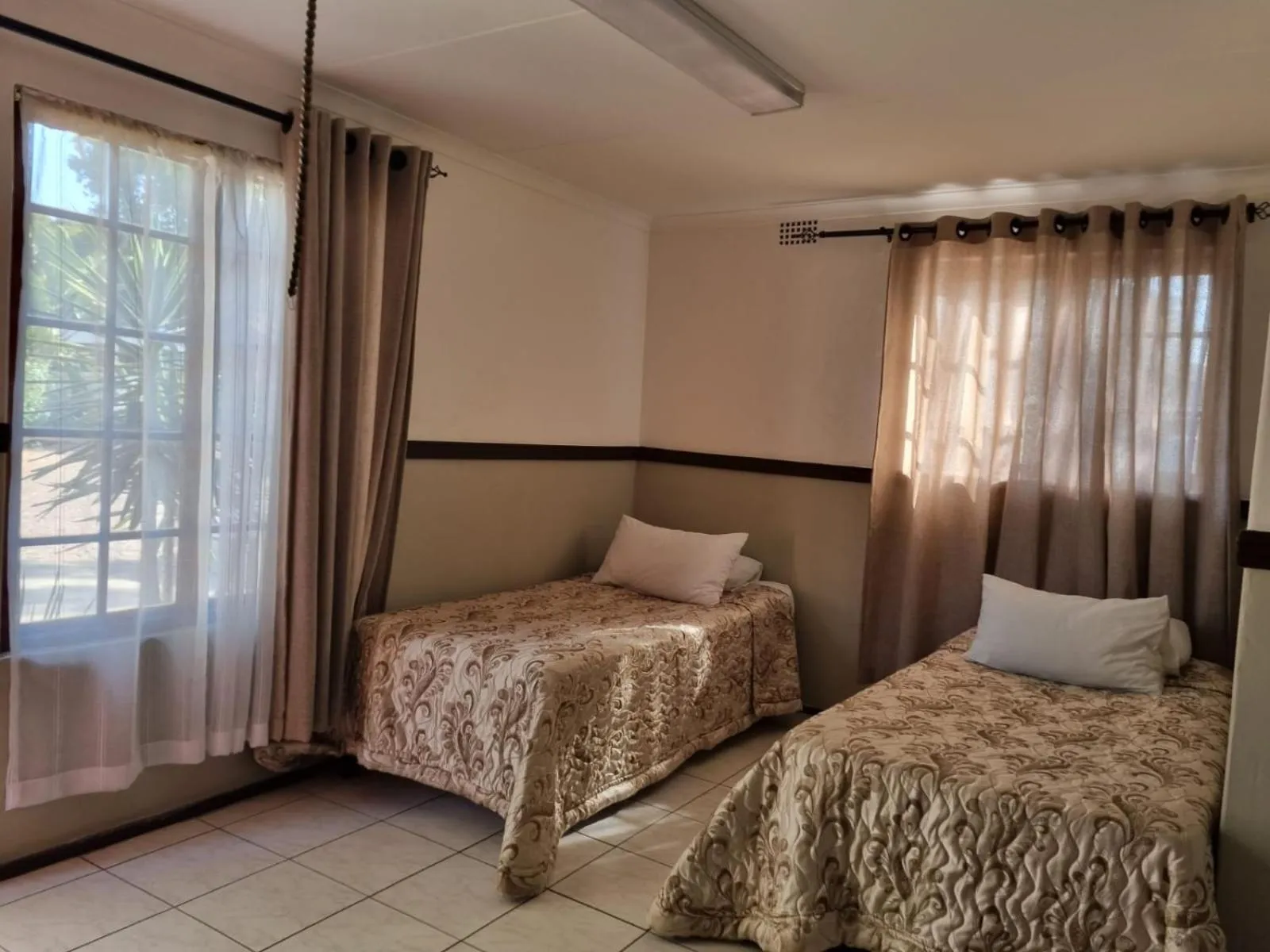 Bed in Emerald Guesthouse