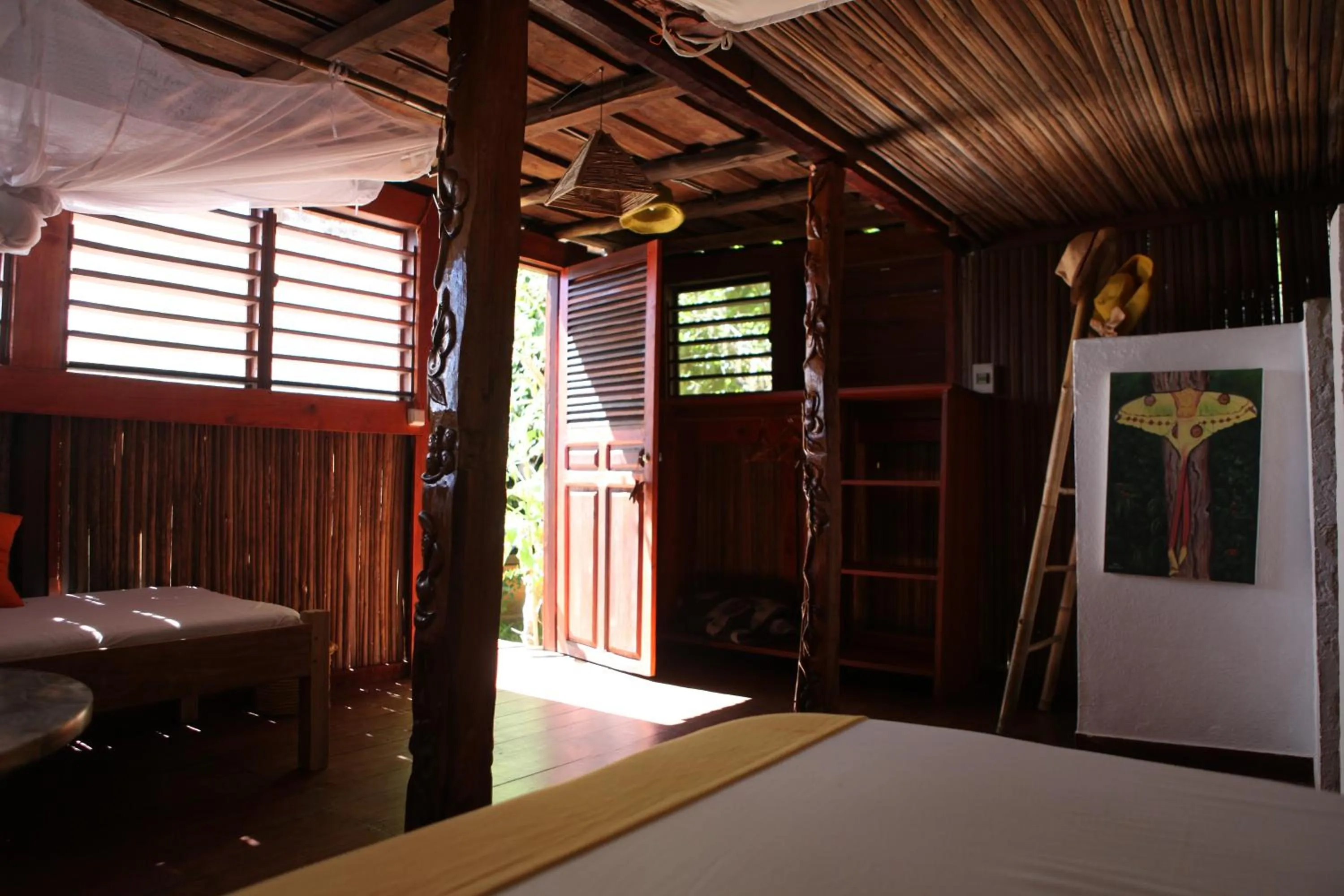 Photo of the whole room, Bed in Floraly Komba Hotel - Nosy Komba