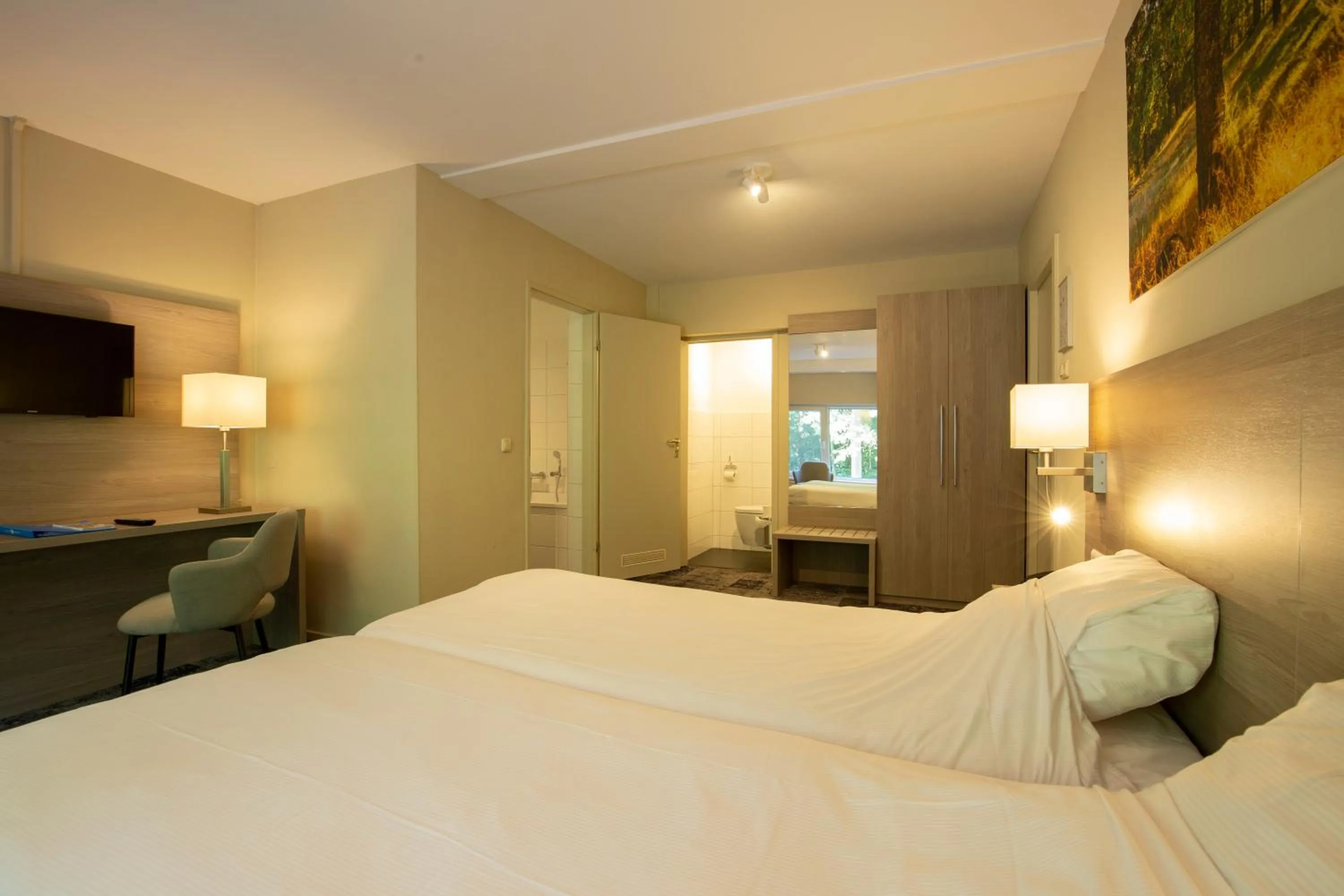 Bed in Fletcher Hotel Restaurant Paasberg