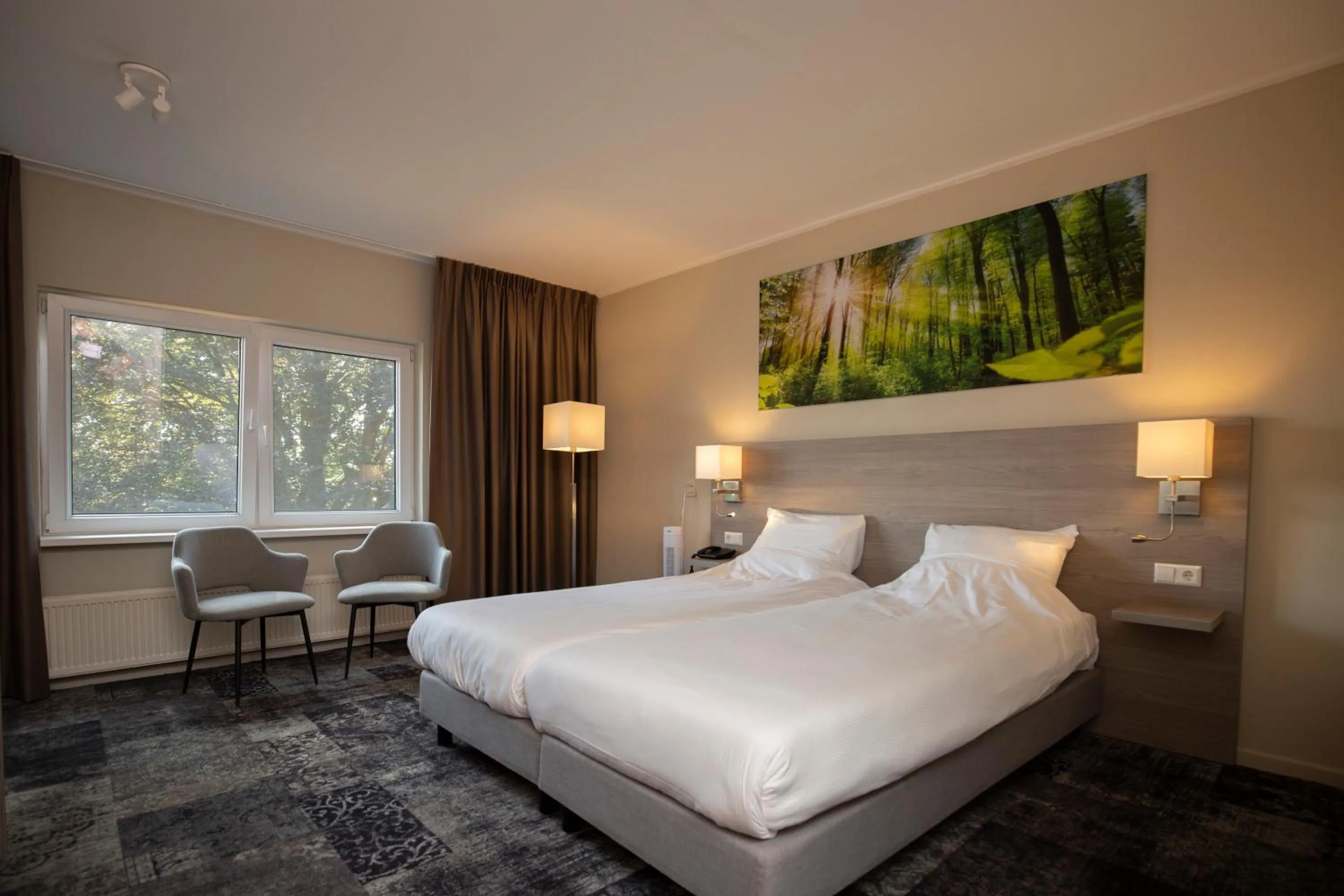 Bed in Fletcher Hotel Restaurant Paasberg