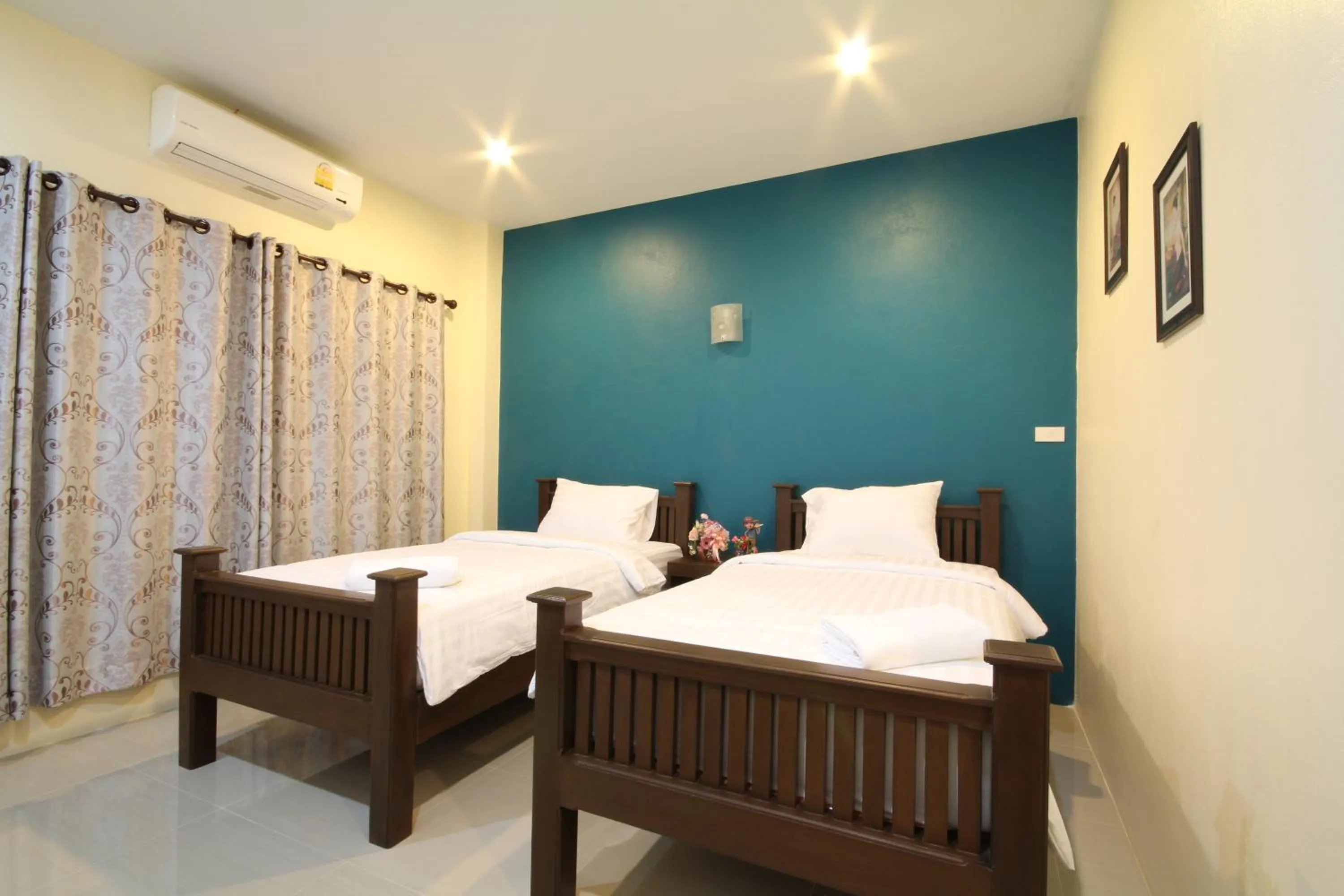 Bed in Blue House Sukhothai