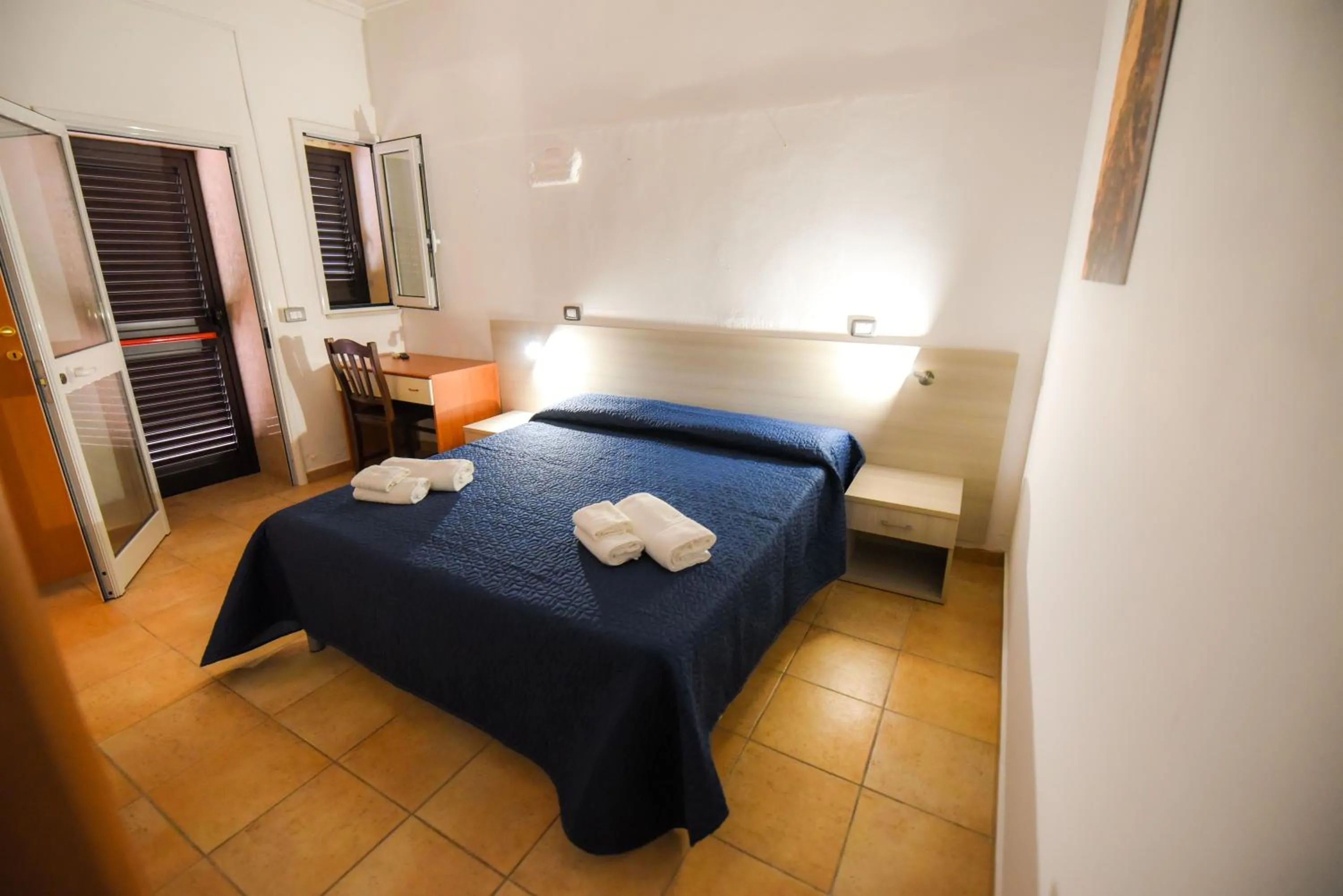 Bed in Giardini Sausari Residence