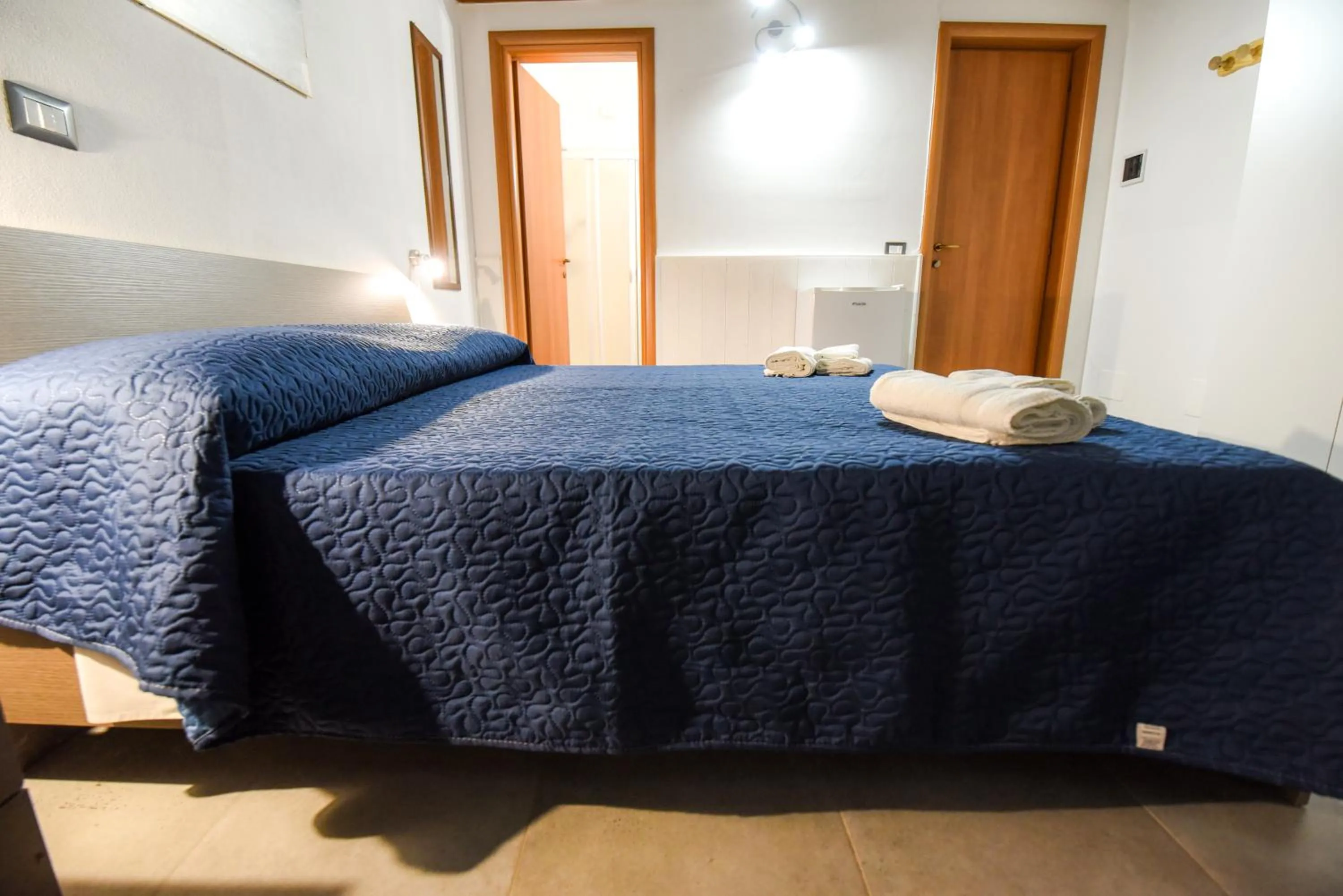 Bed in Giardini Sausari Residence